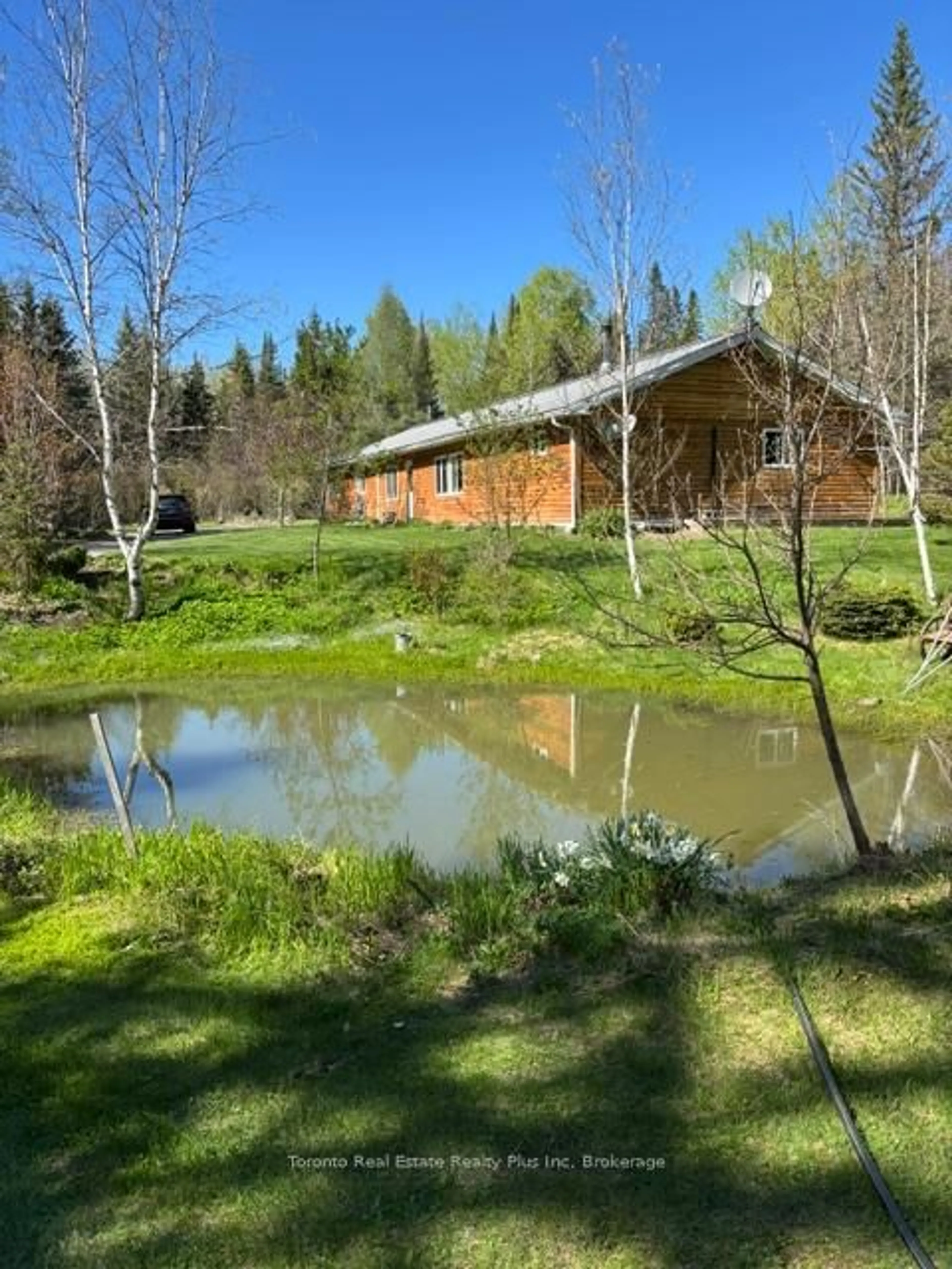A pic from outside/outdoor area/front of a property/back of a property/a pic from drone, water/lake/river/ocean view for 2028 Toggenberg Tr, Kirkland Lake Ontario P0K 1T0