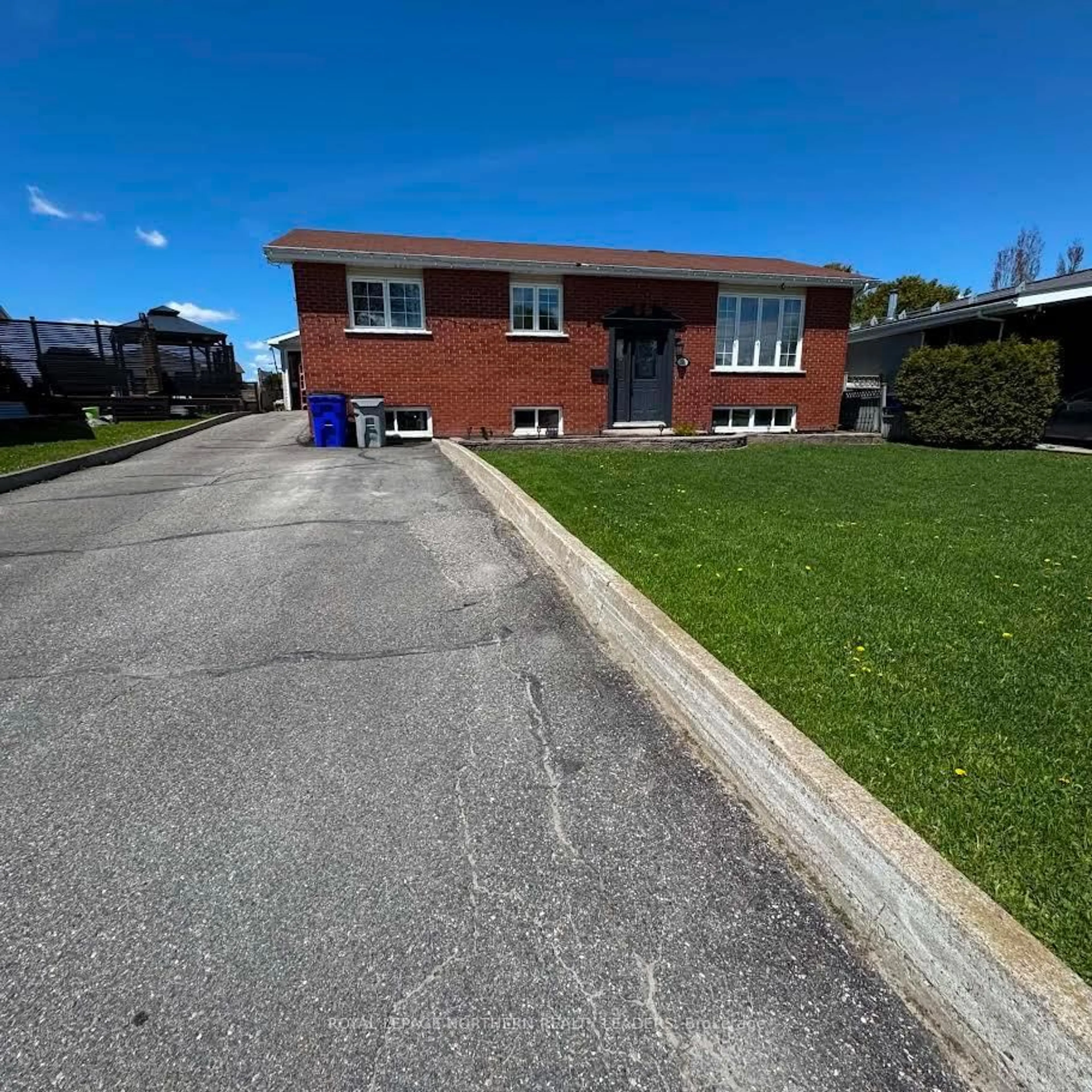A pic from outside/outdoor area/front of a property/back of a property/a pic from drone, street for 246 Timcor Cres, Timmins Ontario P4R 1C7