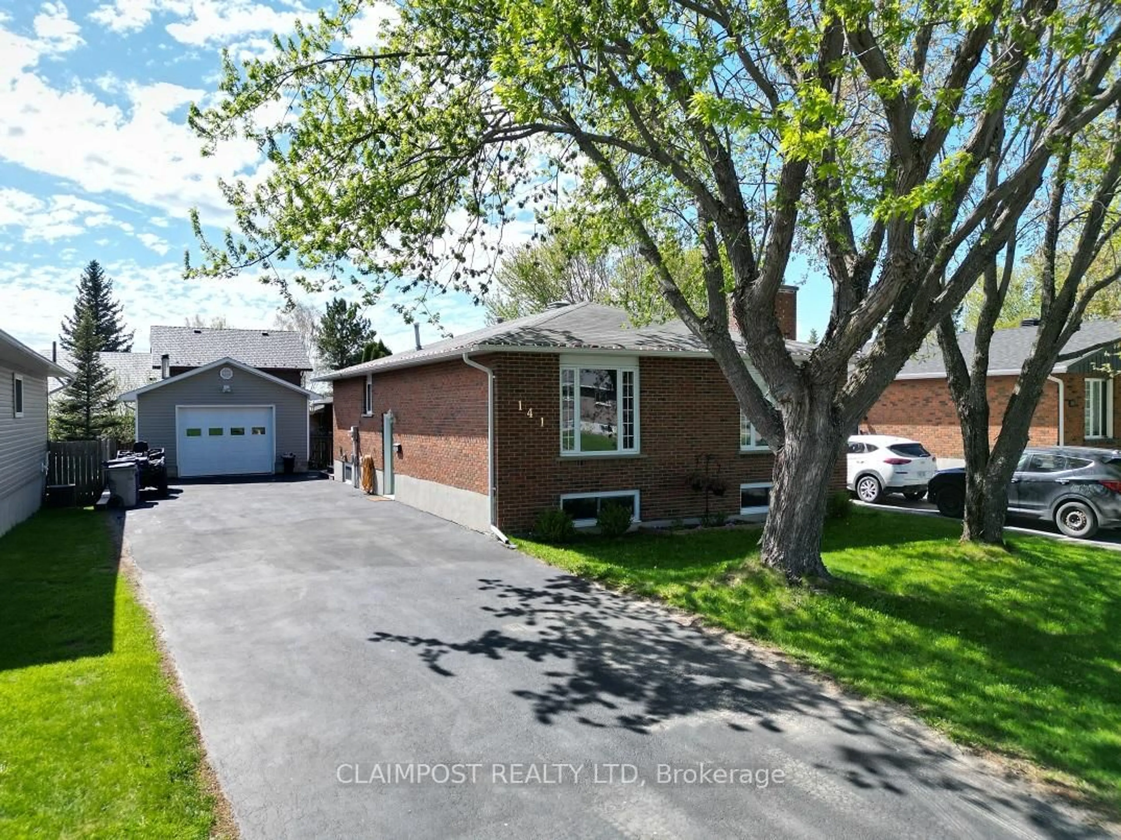 Home with brick exterior material, street for 141 Rose Marie Cres, Timmins Ontario P4P 1B5
