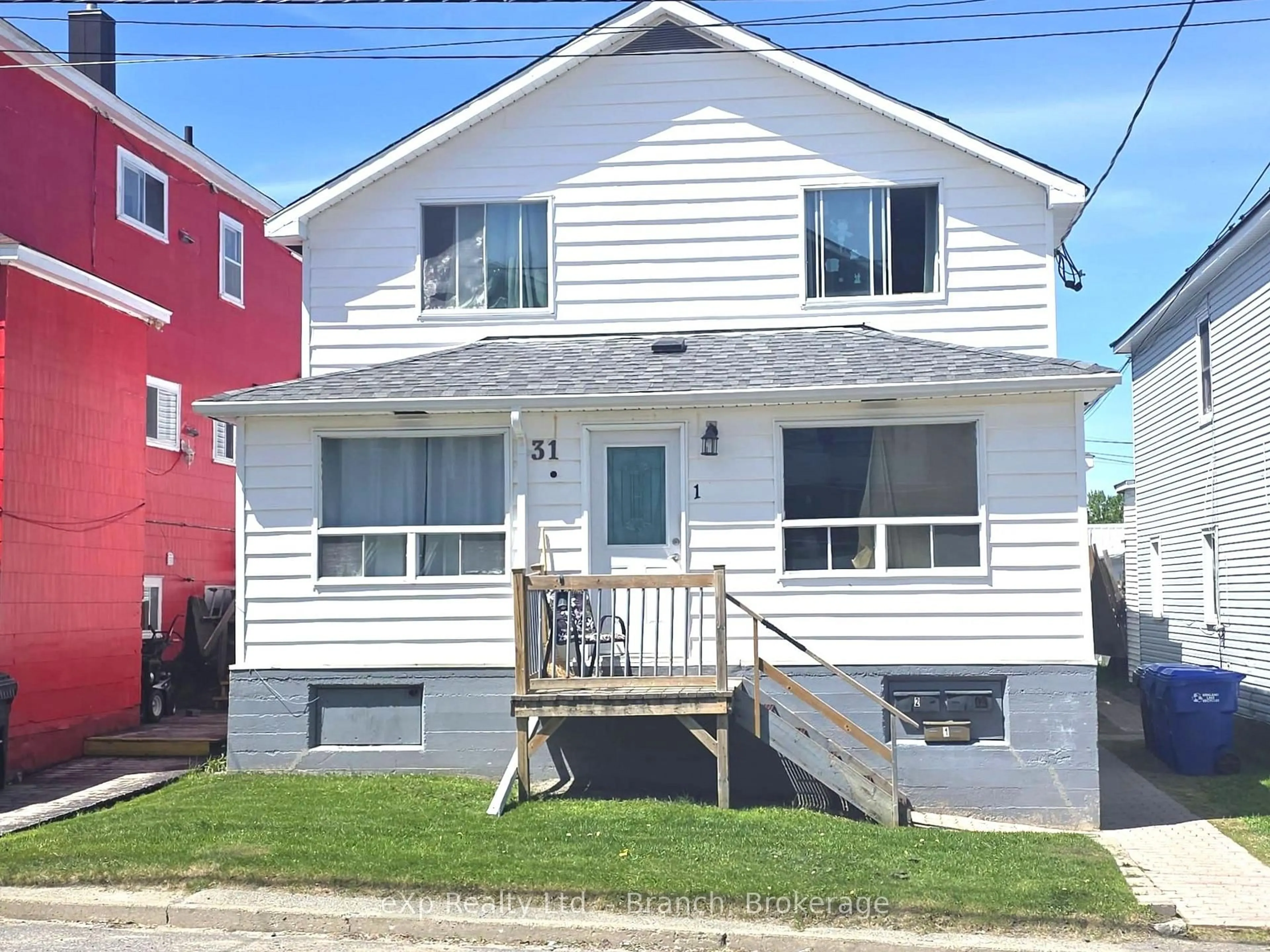 Home with vinyl exterior material, street for 31 Woods St, Kirkland Lake Ontario P2N 3B7