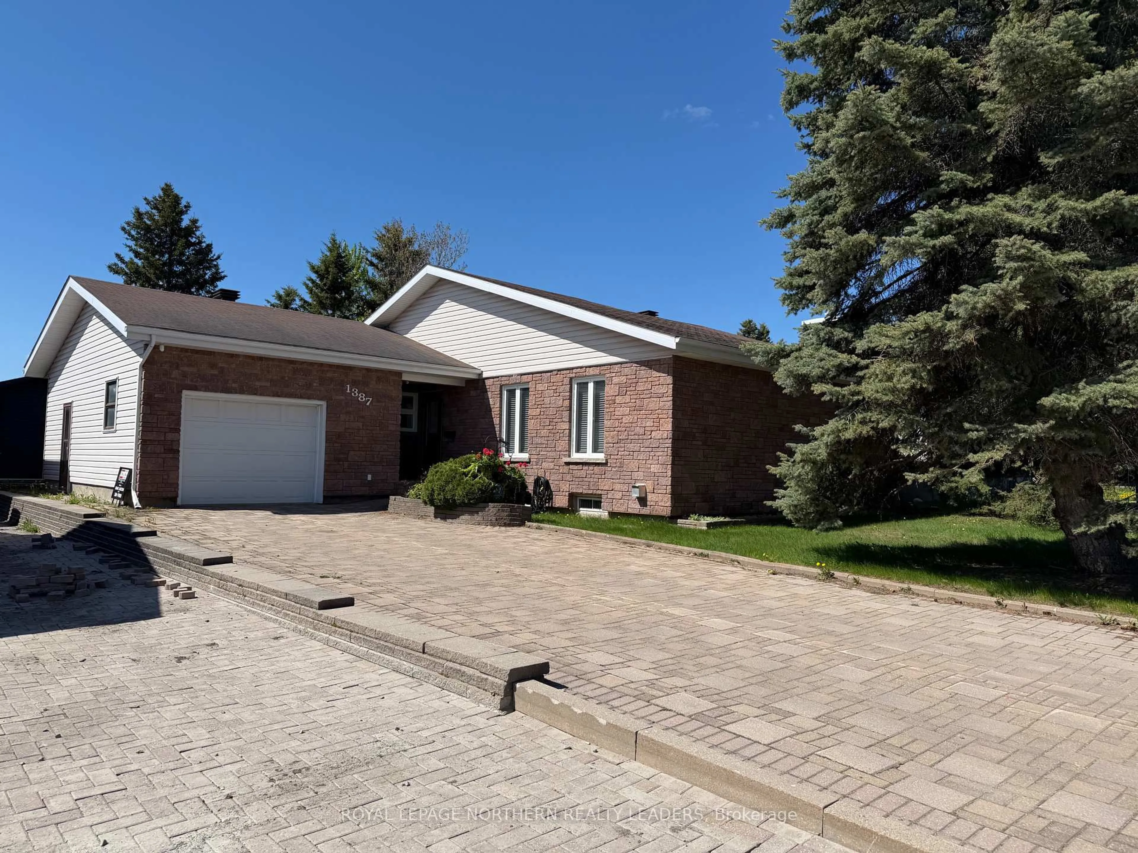 Home with brick exterior material, street for 1387 Chenier Ave, Timmins Ontario P4R 1A8