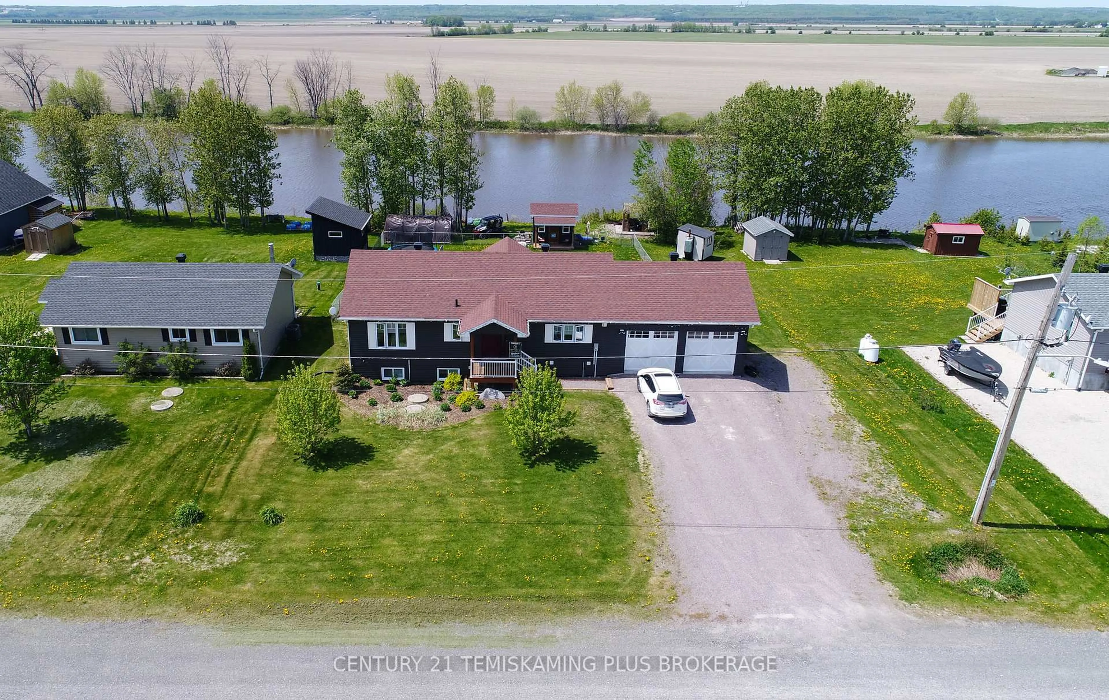 A pic from outside/outdoor area/front of a property/back of a property/a pic from drone, water/lake/river/ocean view for 24 St. Joseph Blvd, Timiskaming Ontario P0J 1A0