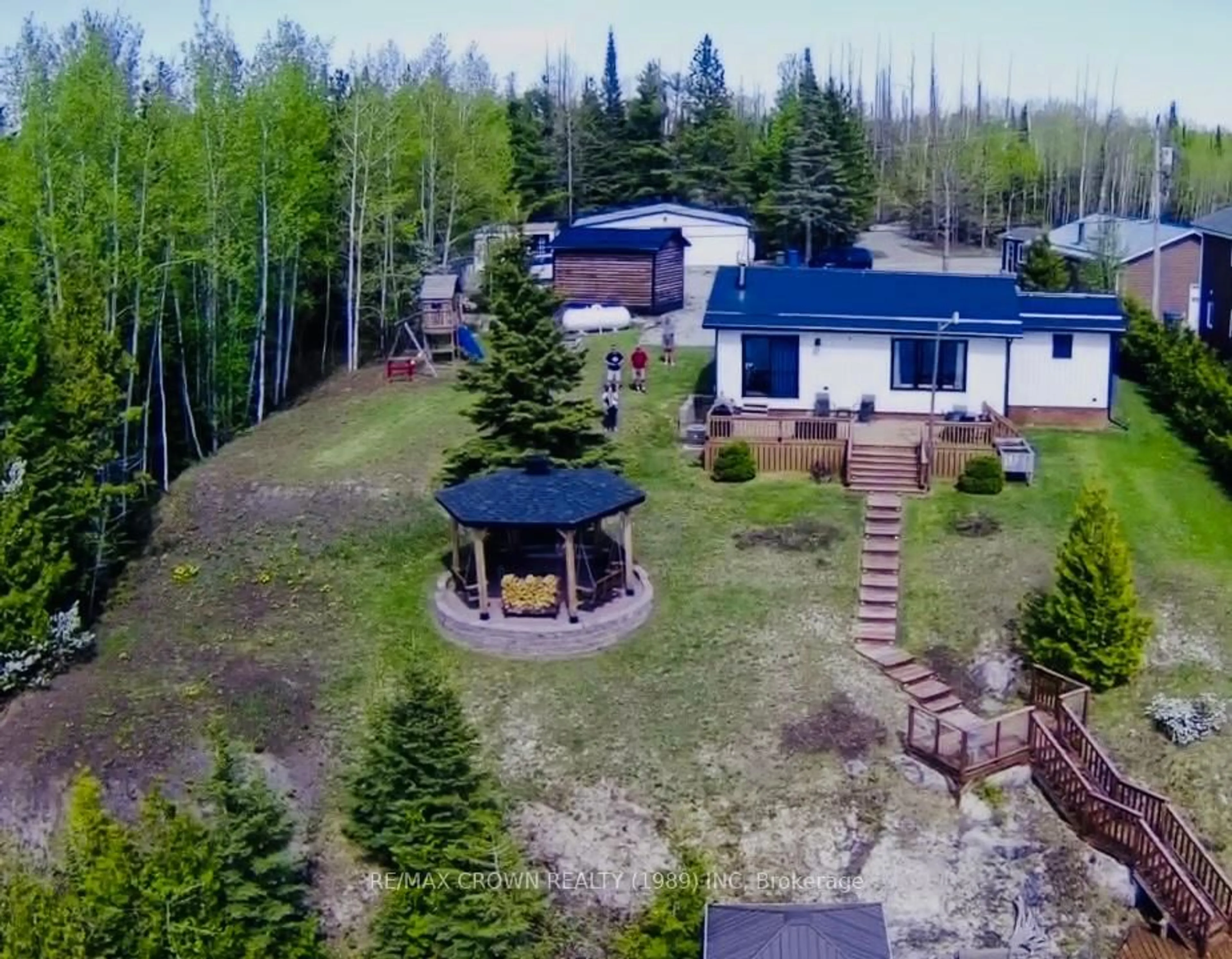 A pic from outside/outdoor area/front of a property/back of a property/a pic from drone, unknown for 31 Lefebvre Peninsula, Moonbeam Rd, Kapuskasing Ontario P0L 1V0
