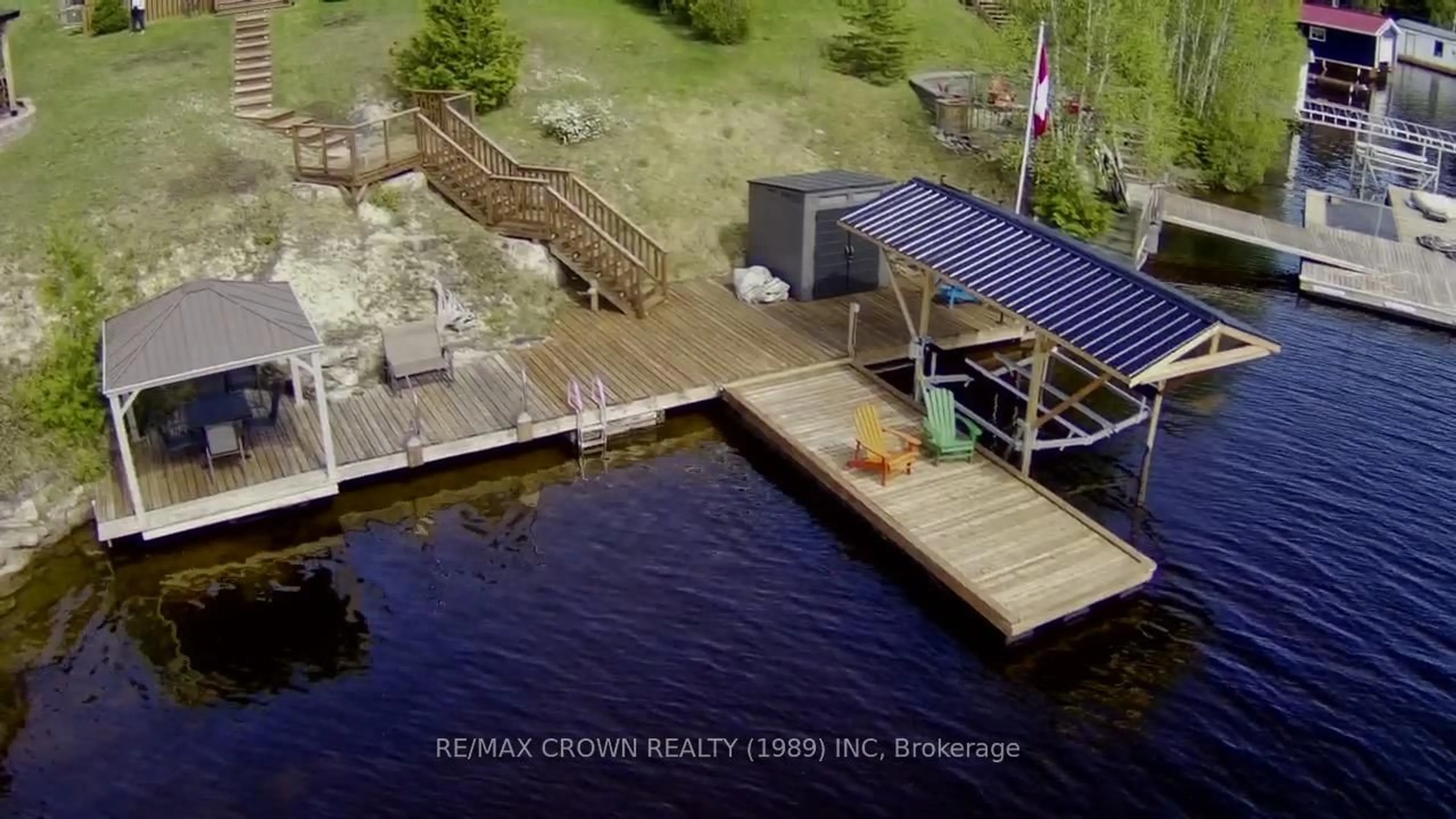 A pic from outside/outdoor area/front of a property/back of a property/a pic from drone, water/lake/river/ocean view for 31 Lefebvre Peninsula, Moonbeam Rd, Kapuskasing Ontario P0L 1V0