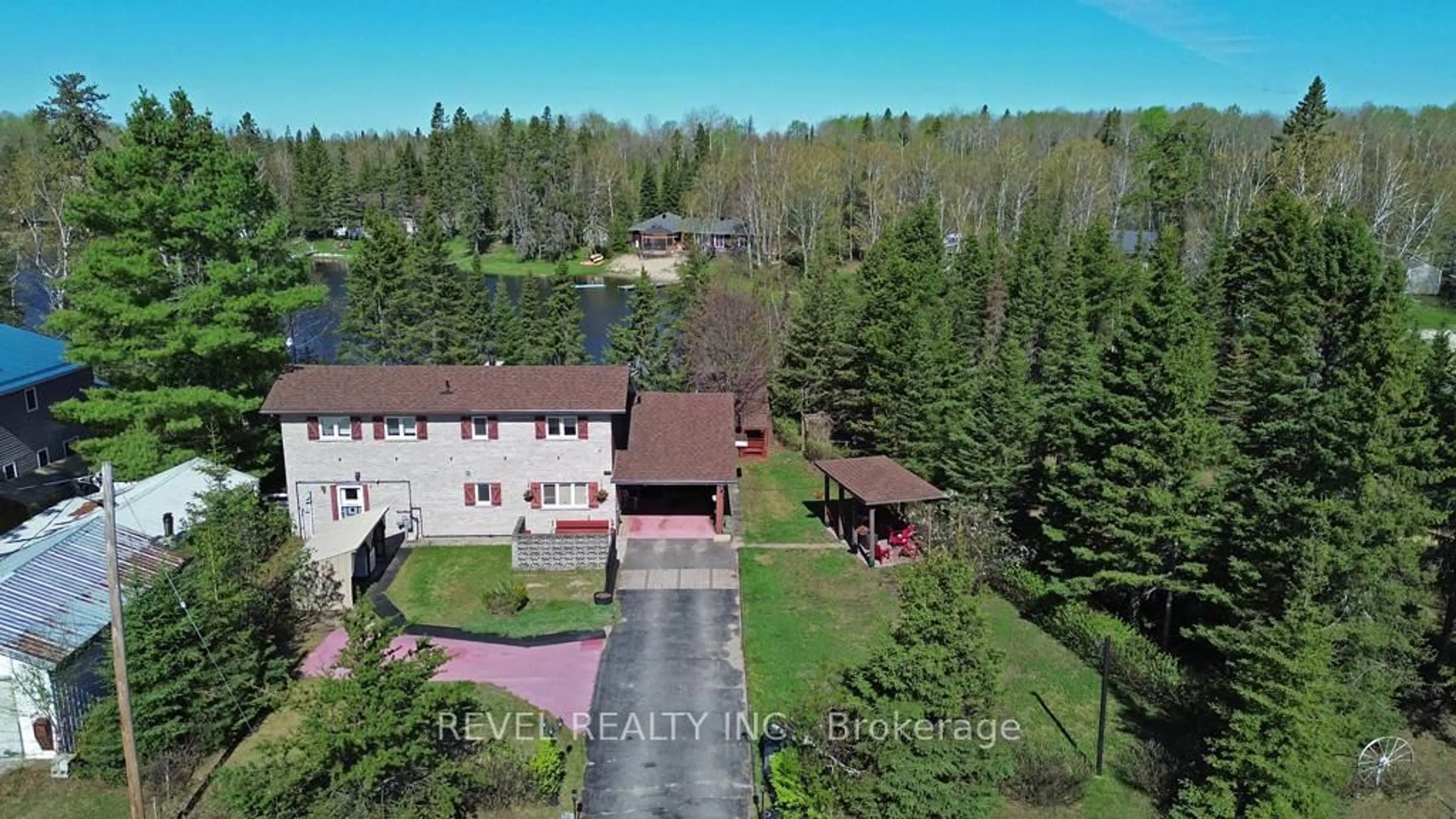 A pic from outside/outdoor area/front of a property/back of a property/a pic from drone, unknown for 124 Sunset Bay Rd, Iroquois Falls Ontario P0K 1G0