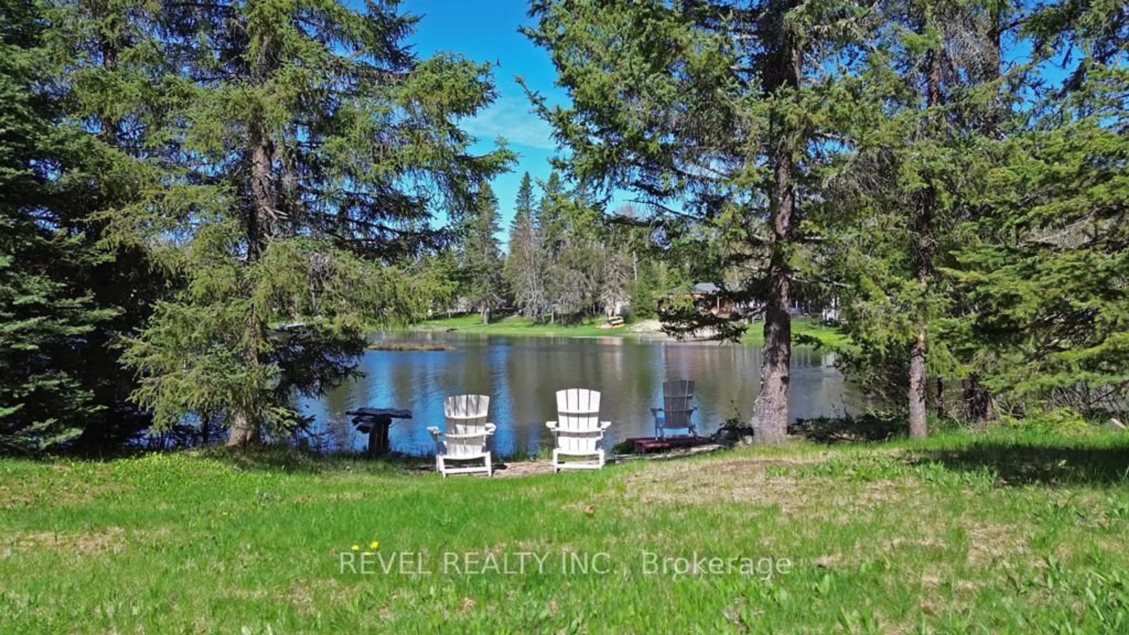 A pic from outside/outdoor area/front of a property/back of a property/a pic from drone, water/lake/river/ocean view for 124 Sunset Bay Rd, Iroquois Falls Ontario P0K 1G0