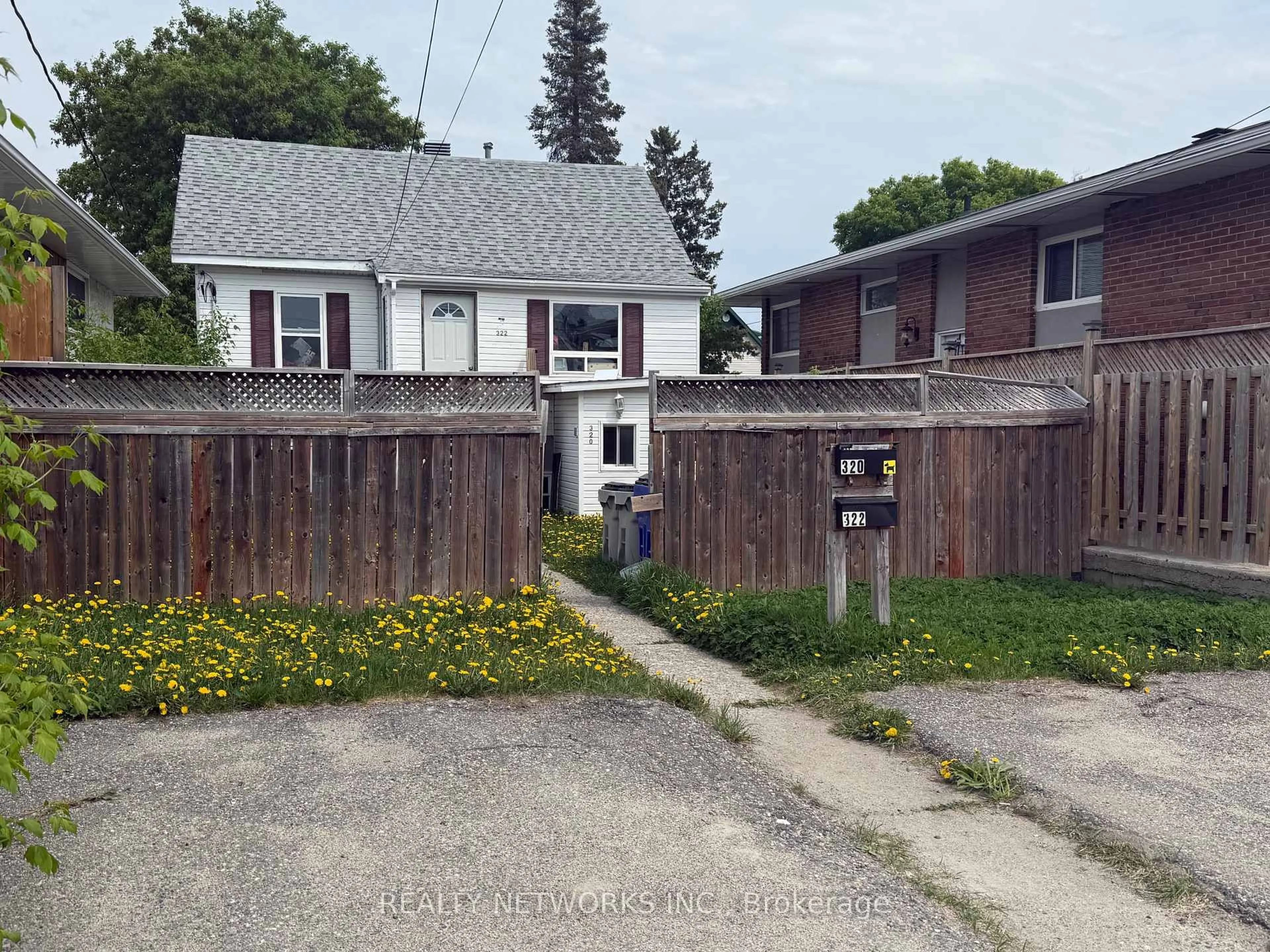 A pic from outside/outdoor area/front of a property/back of a property/a pic from drone, street for 320 Birch St, Timmins Ontario P4N 6E6