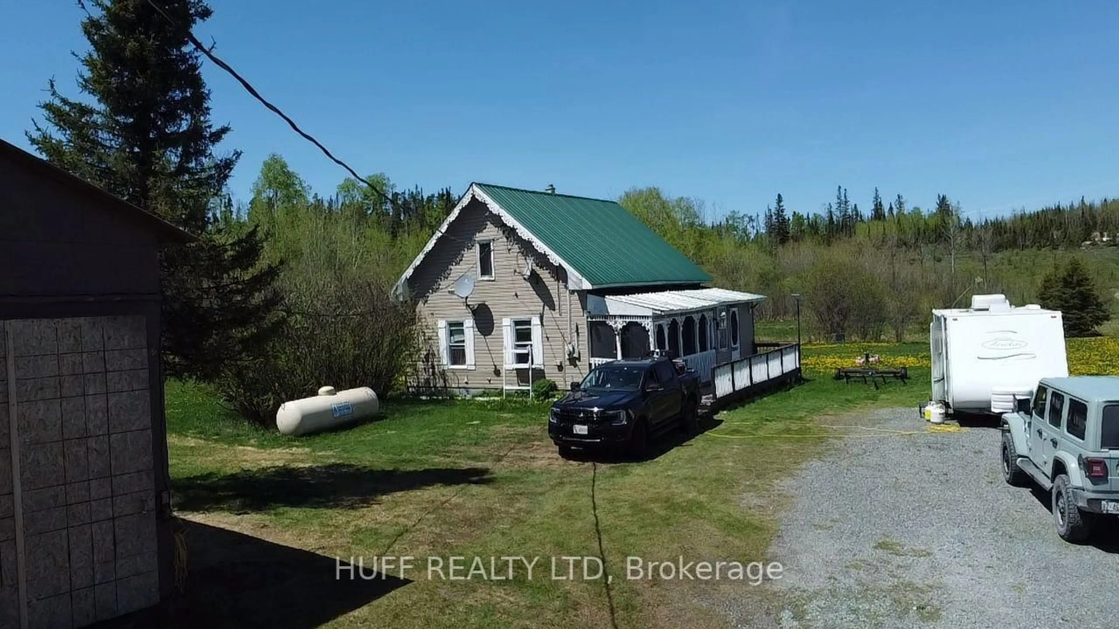 A pic from outside/outdoor area/front of a property/back of a property/a pic from drone, unknown for 101 Haavisto Rd, Kirkland Lake Ontario P0K 1V0