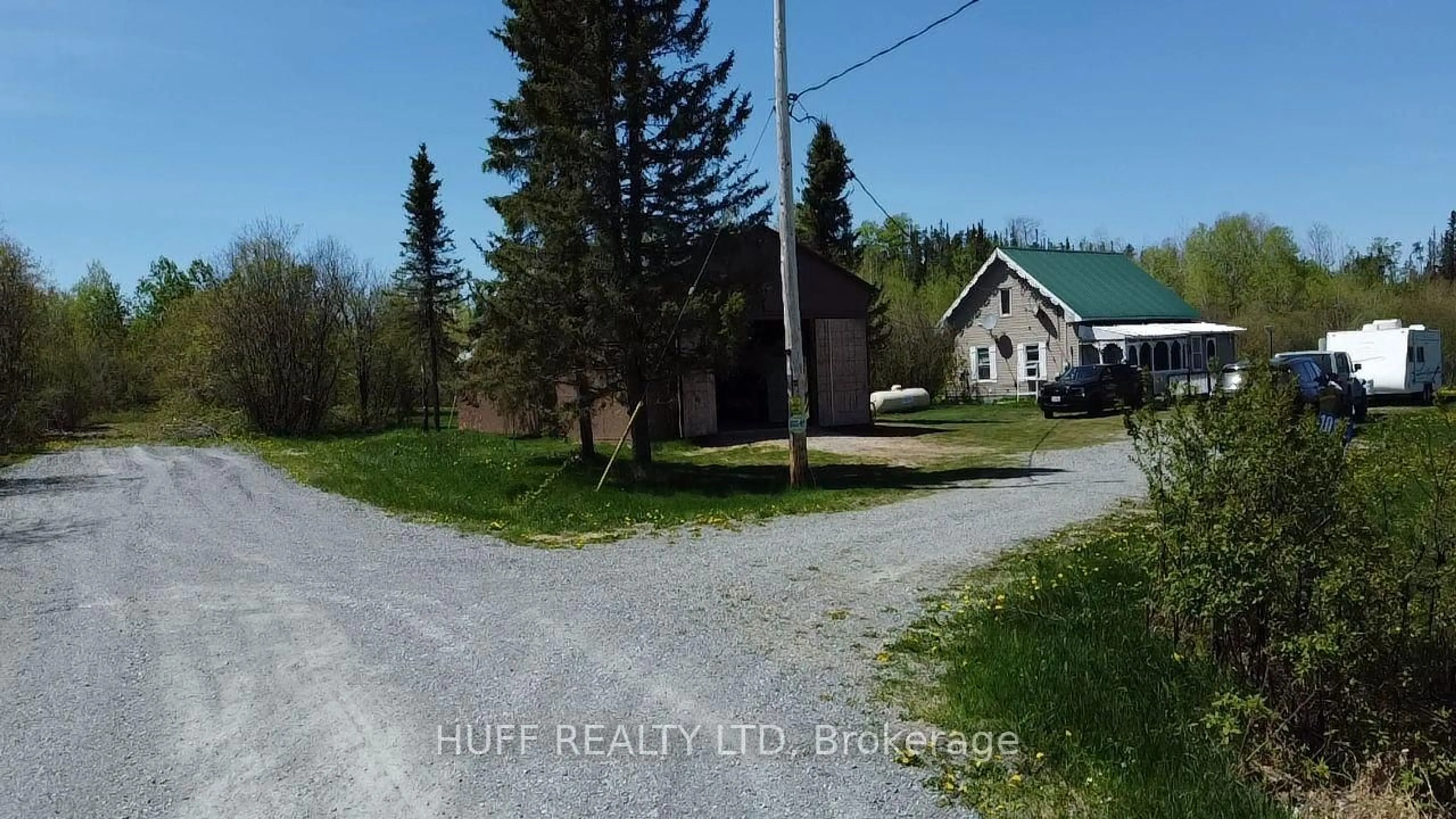 A pic from outside/outdoor area/front of a property/back of a property/a pic from drone, unknown for 101 Haavisto Rd, Kirkland Lake Ontario P0K 1V0