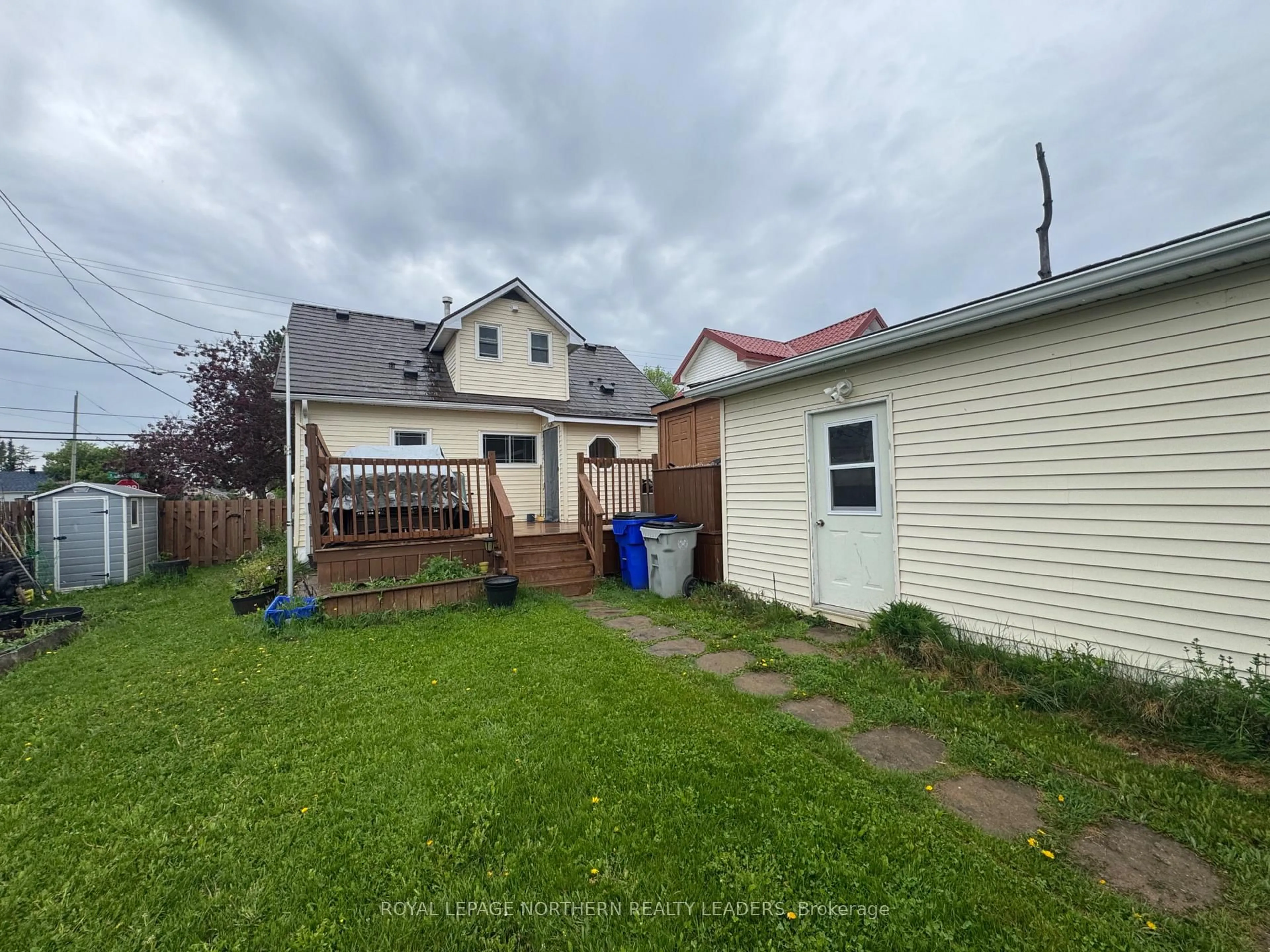 A pic from outside/outdoor area/front of a property/back of a property/a pic from drone, street for 99 Crawford St, Timmins Ontario P0N 1H0