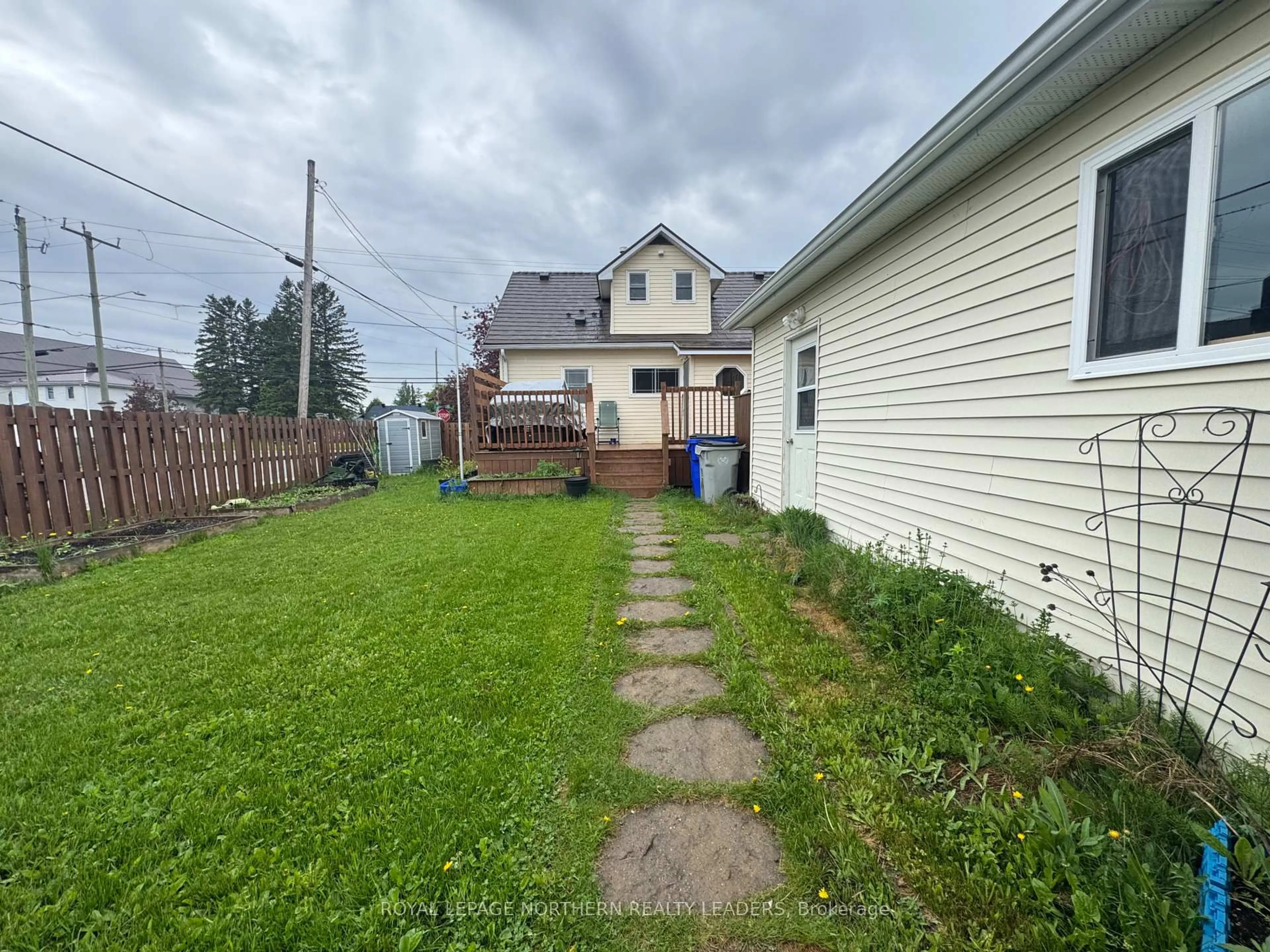 A pic from outside/outdoor area/front of a property/back of a property/a pic from drone, street for 99 Crawford St, Timmins Ontario P0N 1H0
