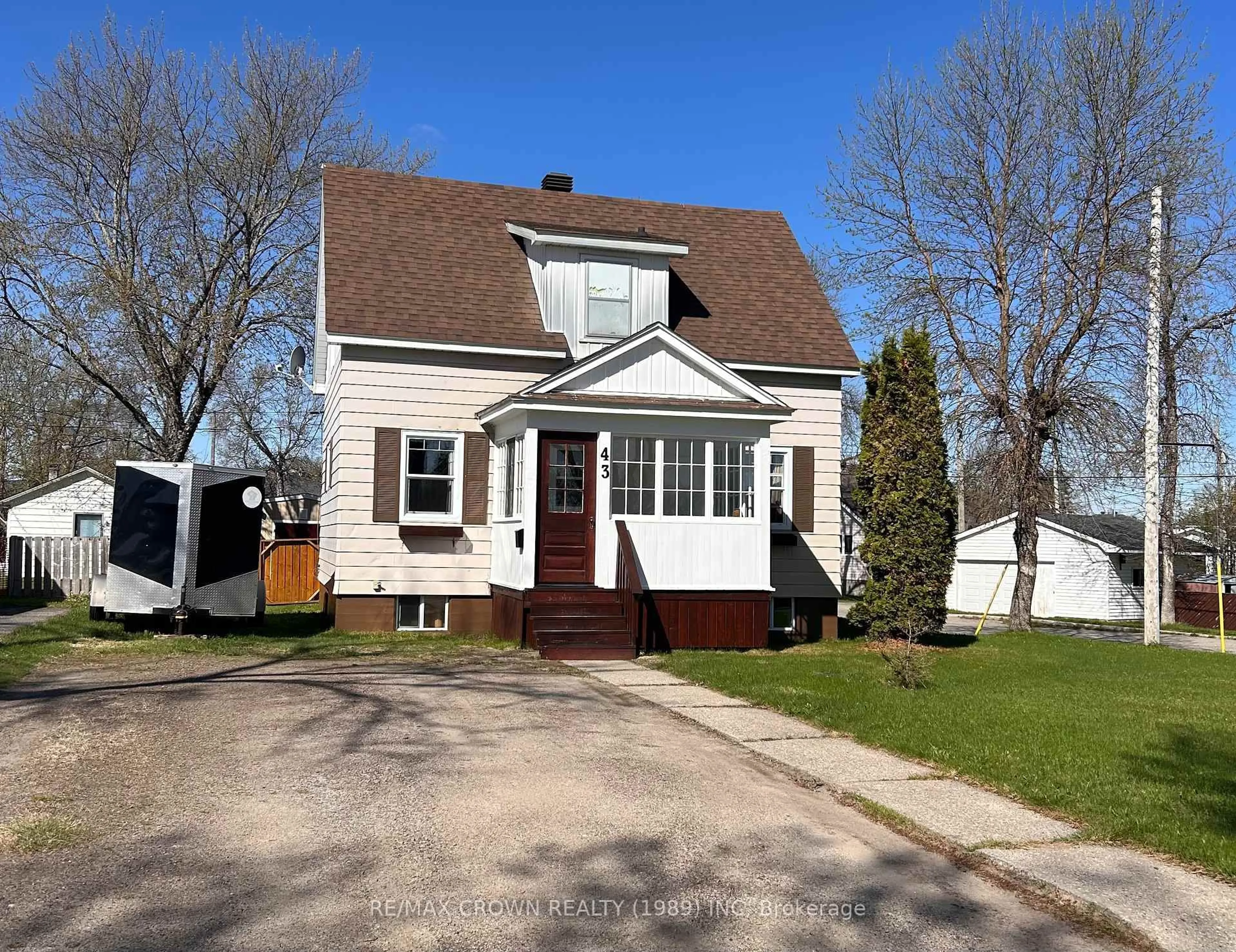 Home with vinyl exterior material, street for 43 Bowman Ave, Kapuskasing Ontario P5N 1M9