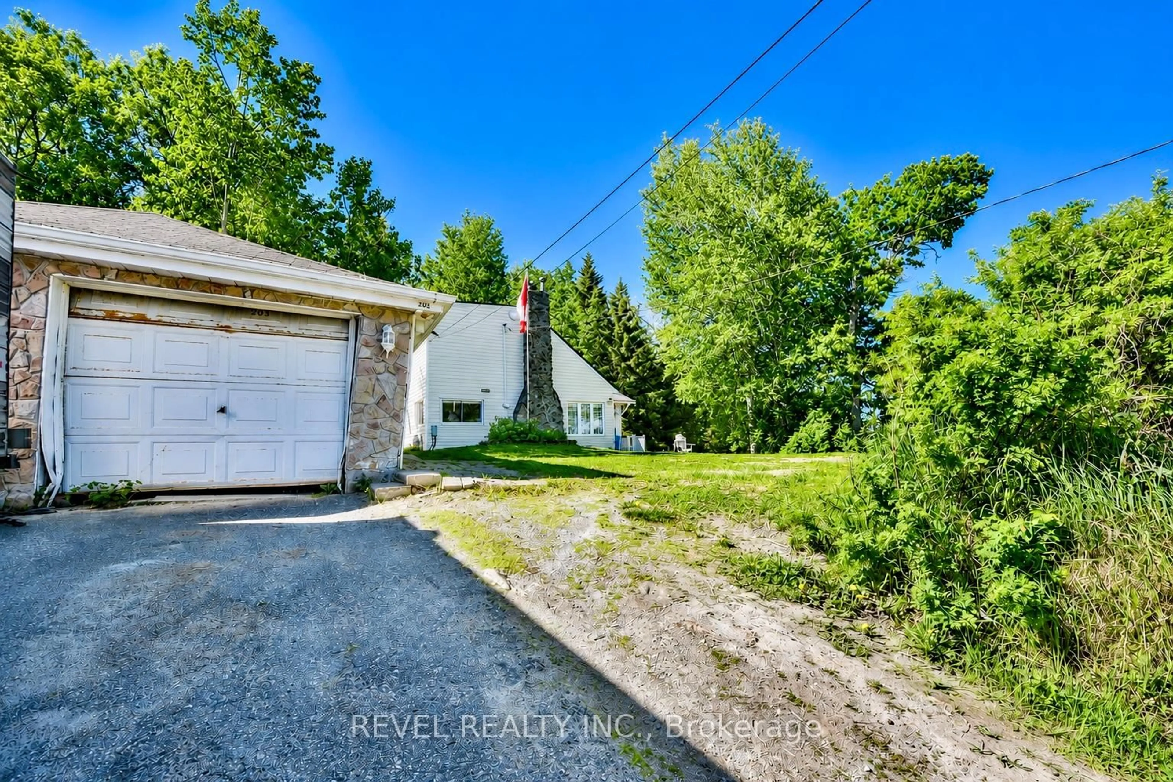 A pic from outside/outdoor area/front of a property/back of a property/a pic from drone, street for 203 Dixon St, Timmins Ontario P0N 1C0