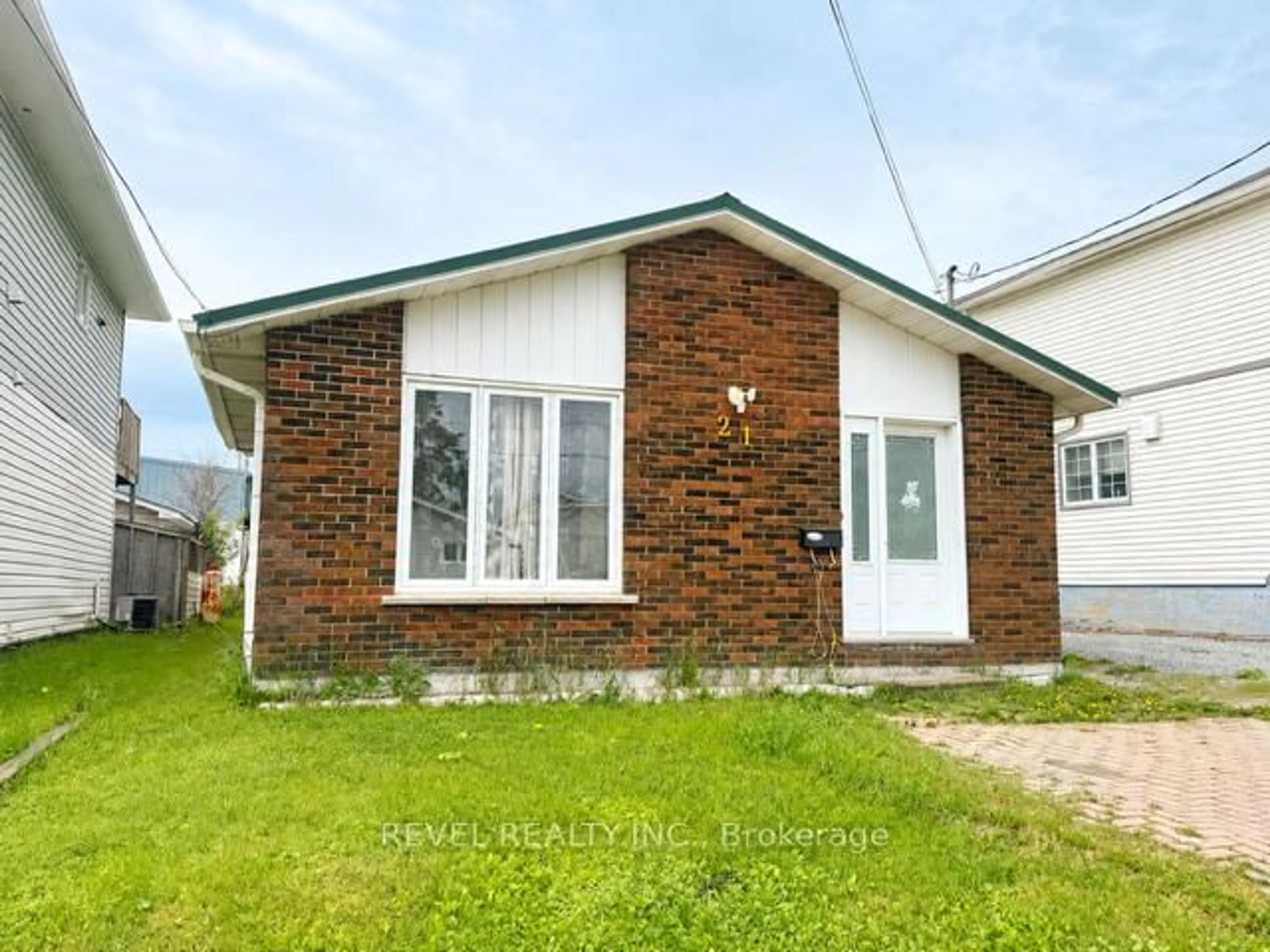 Home with brick exterior material, building for 21 Avenue Rd, Timmins Ontario P4N 5C8