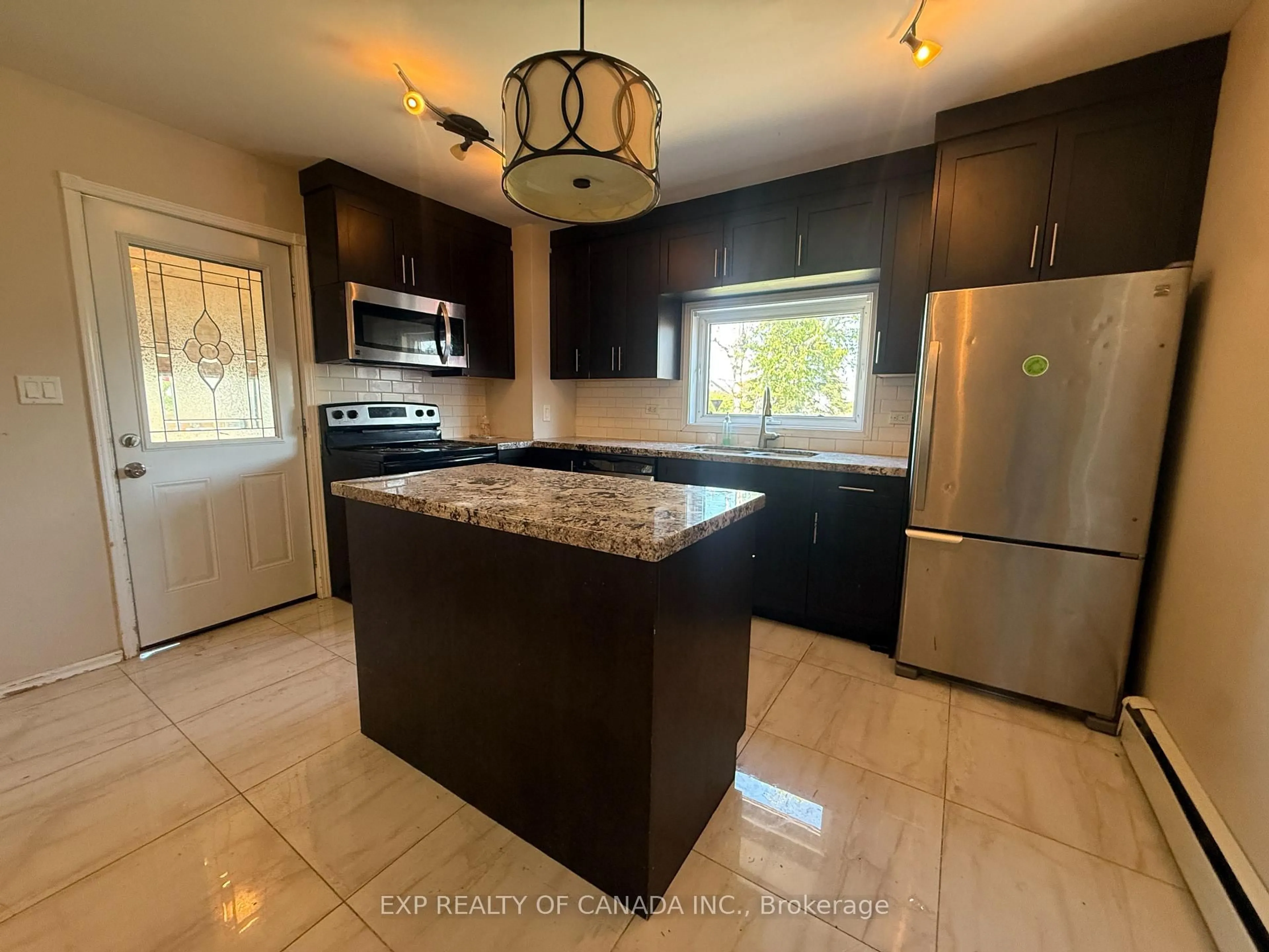 Open concept kitchen, ceramic/tile floor for 72 Wende Ave, Timmins Ontario P4N 3E2