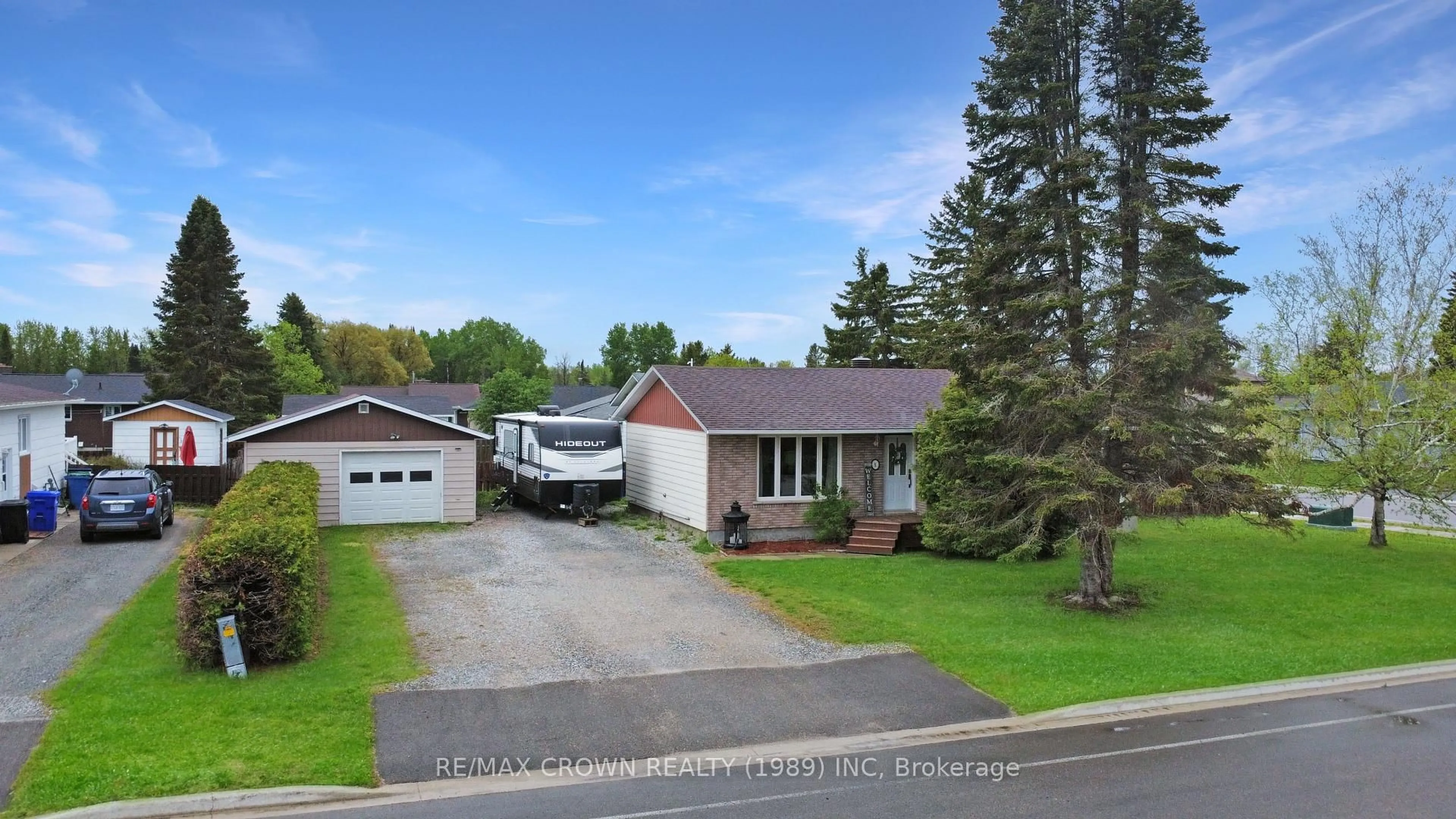 A pic from outside/outdoor area/front of a property/back of a property/a pic from drone, street for 1 Pearson Dr, Hearst Ontario P0L 1N0