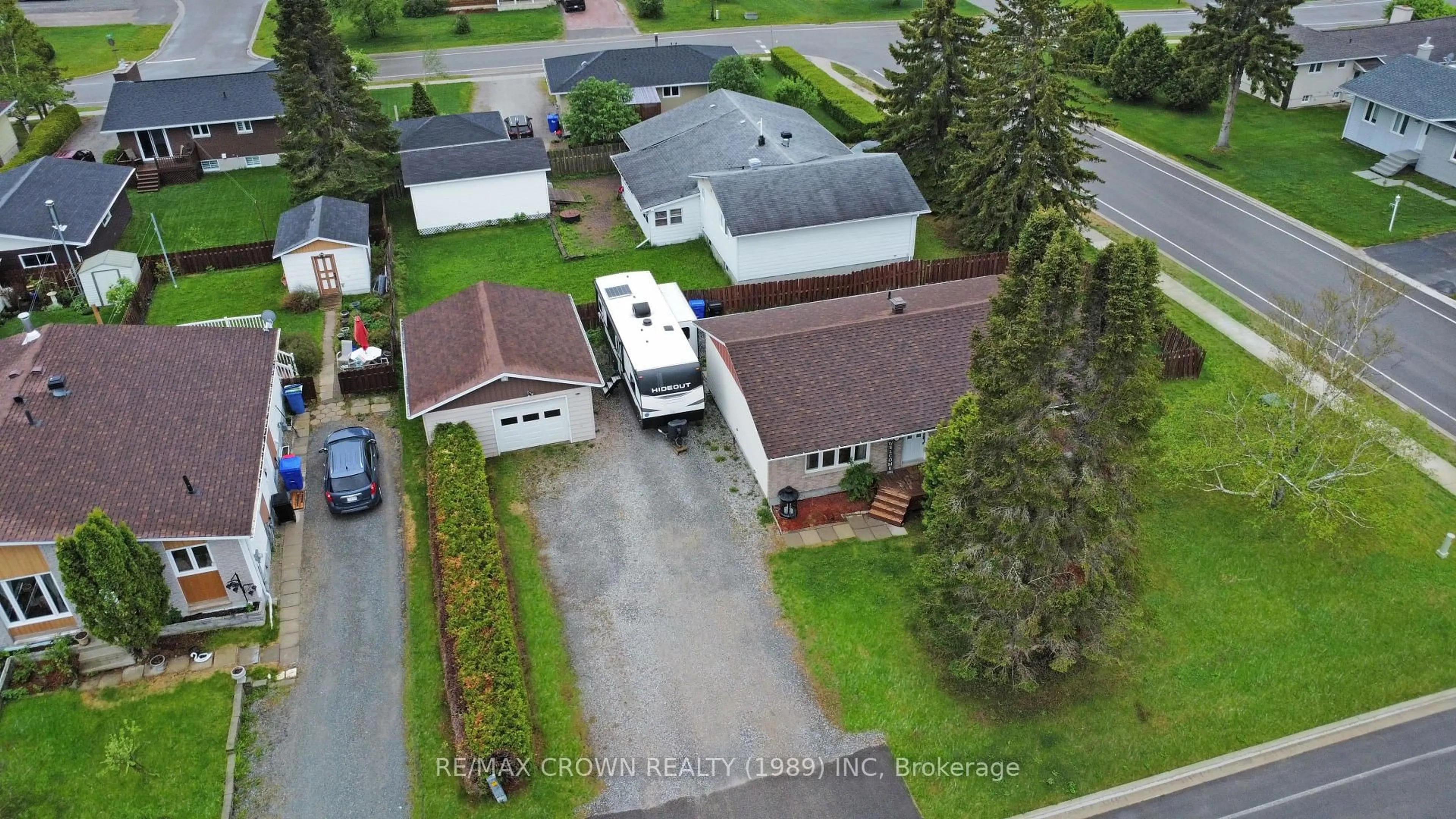 A pic from outside/outdoor area/front of a property/back of a property/a pic from drone, street for 1 Pearson Dr, Hearst Ontario P0L 1N0