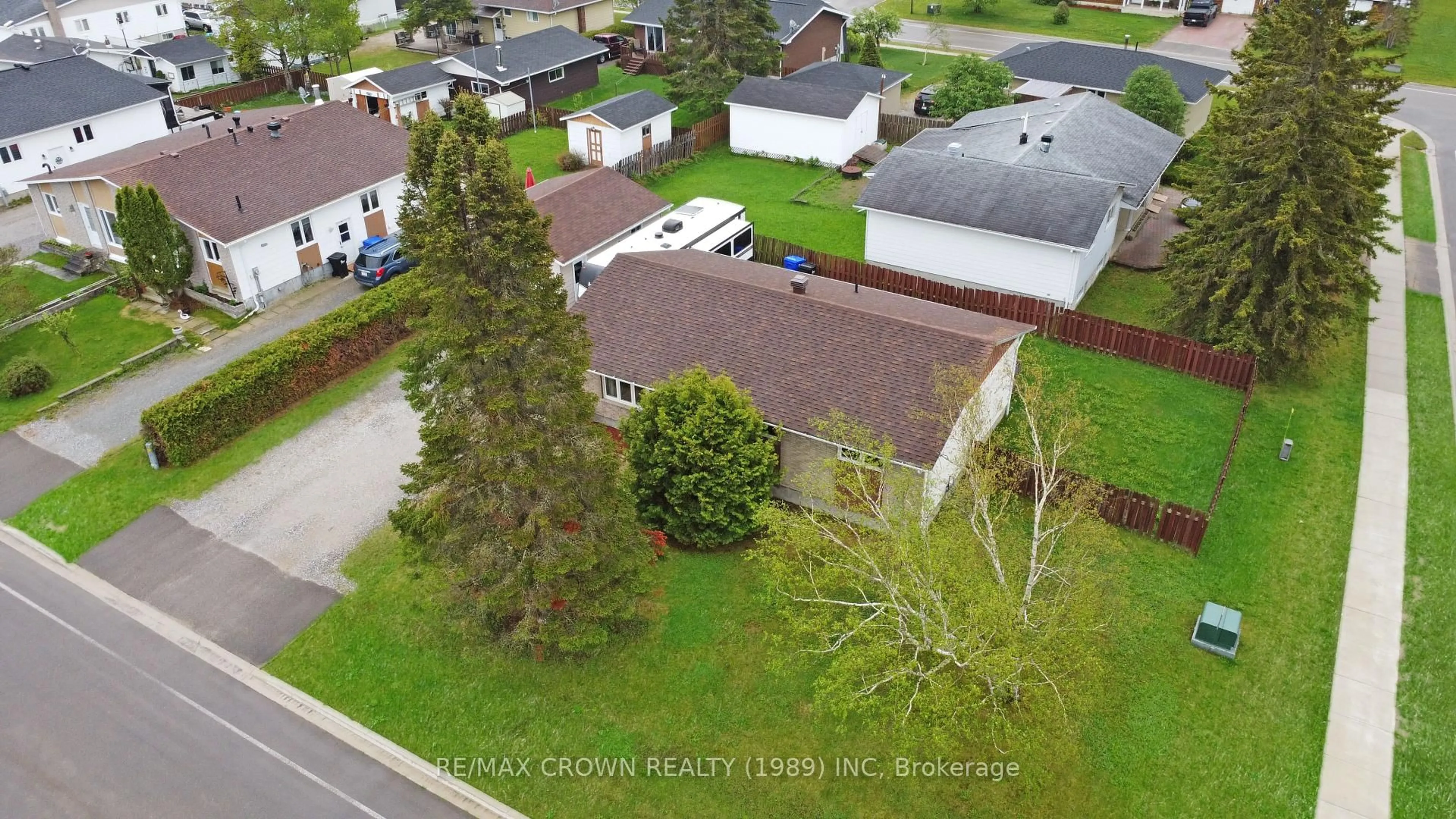 A pic from outside/outdoor area/front of a property/back of a property/a pic from drone, street for 1 Pearson Dr, Hearst Ontario P0L 1N0