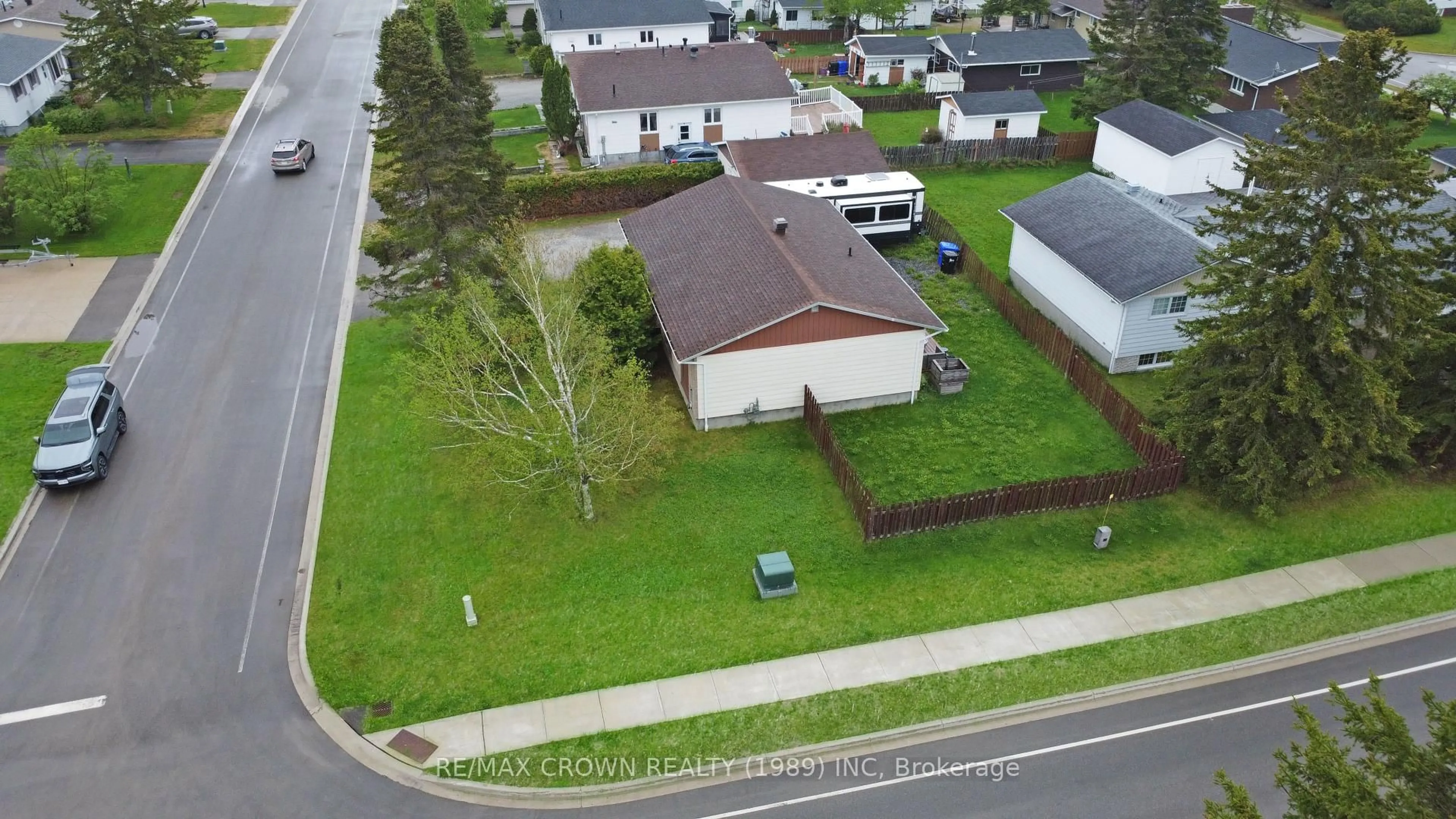 A pic from outside/outdoor area/front of a property/back of a property/a pic from drone, street for 1 Pearson Dr, Hearst Ontario P0L 1N0