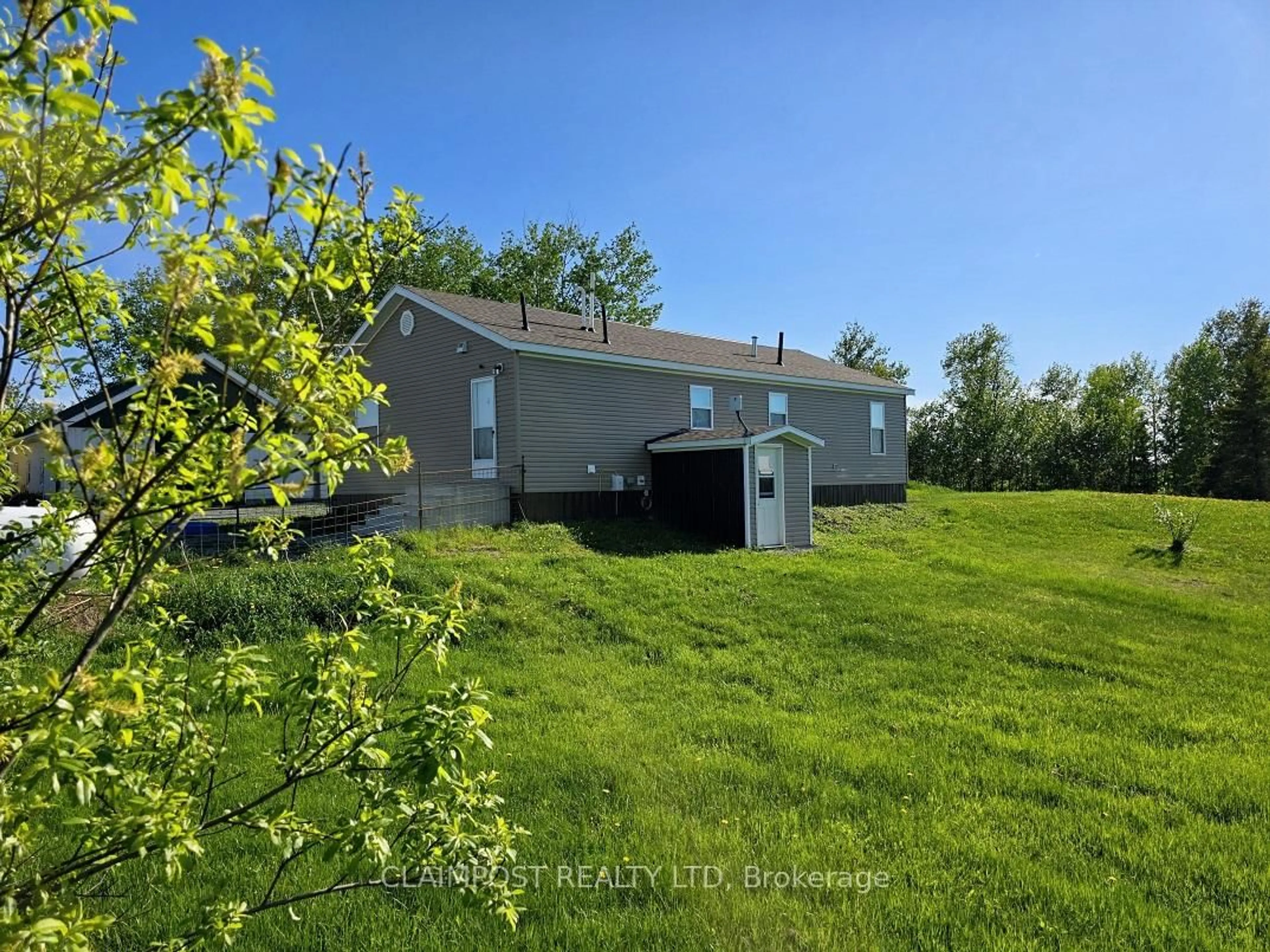 A pic from outside/outdoor area/front of a property/back of a property/a pic from drone, water/lake/river/ocean view for 1089 Sapphire Rd, Black River-Matheson Ontario P0K 1N0