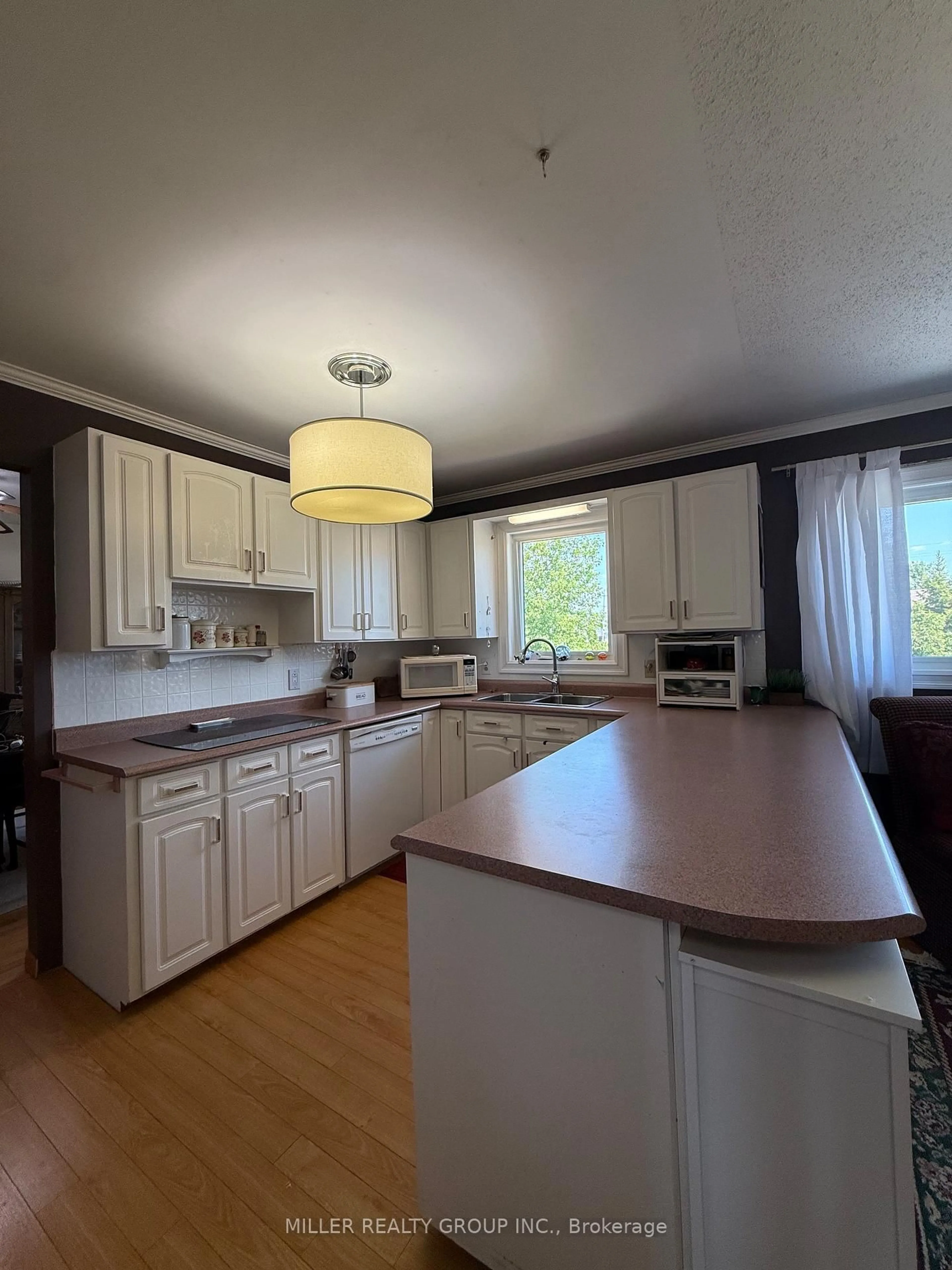 Open concept kitchen, wood/laminate floor for 33 Ninth Ave, Armstrong Ontario P0J 1E0