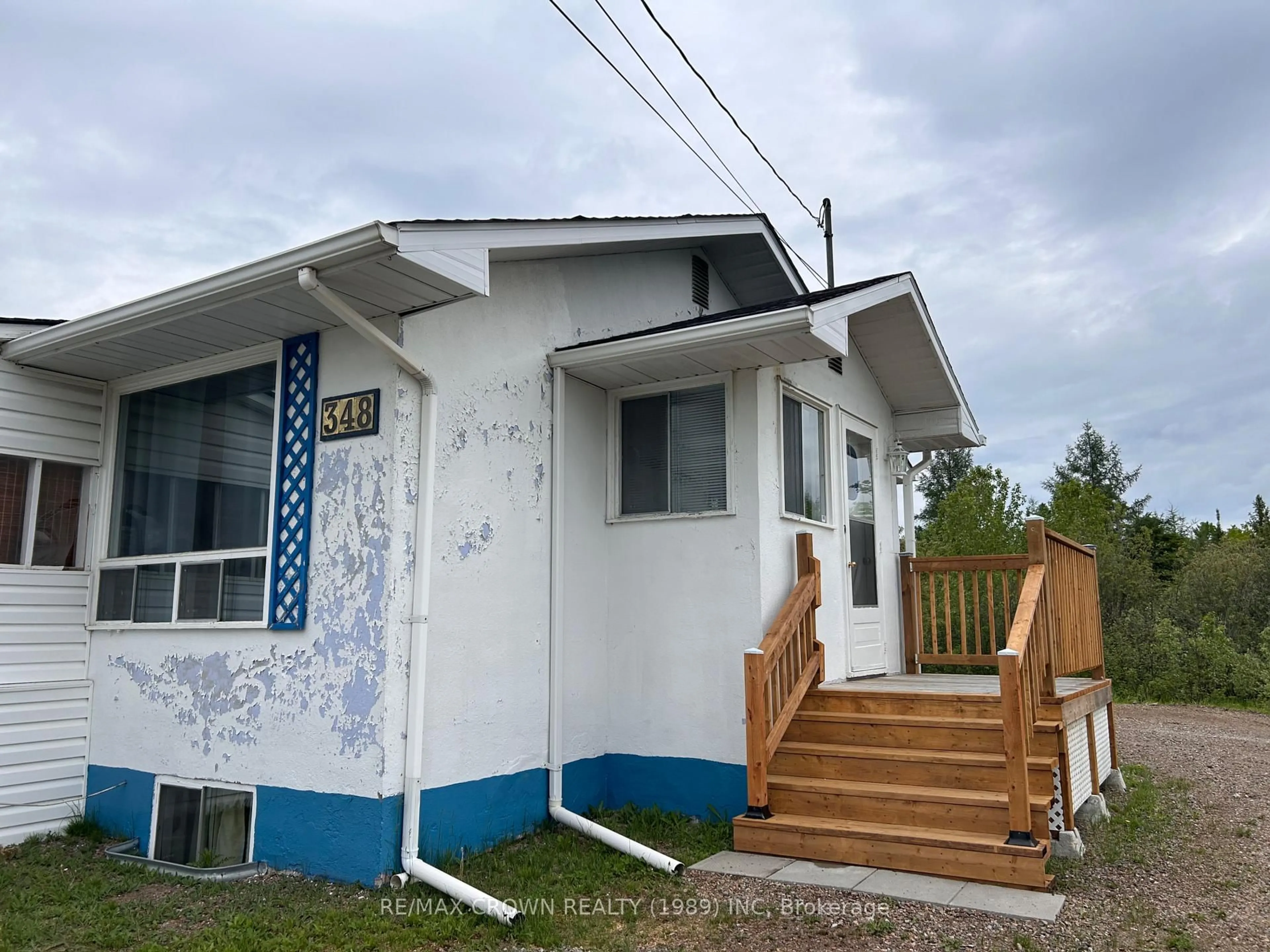 Home with vinyl exterior material, street for 348 Government Rd, Kapuskasing Ontario P5N 2X8