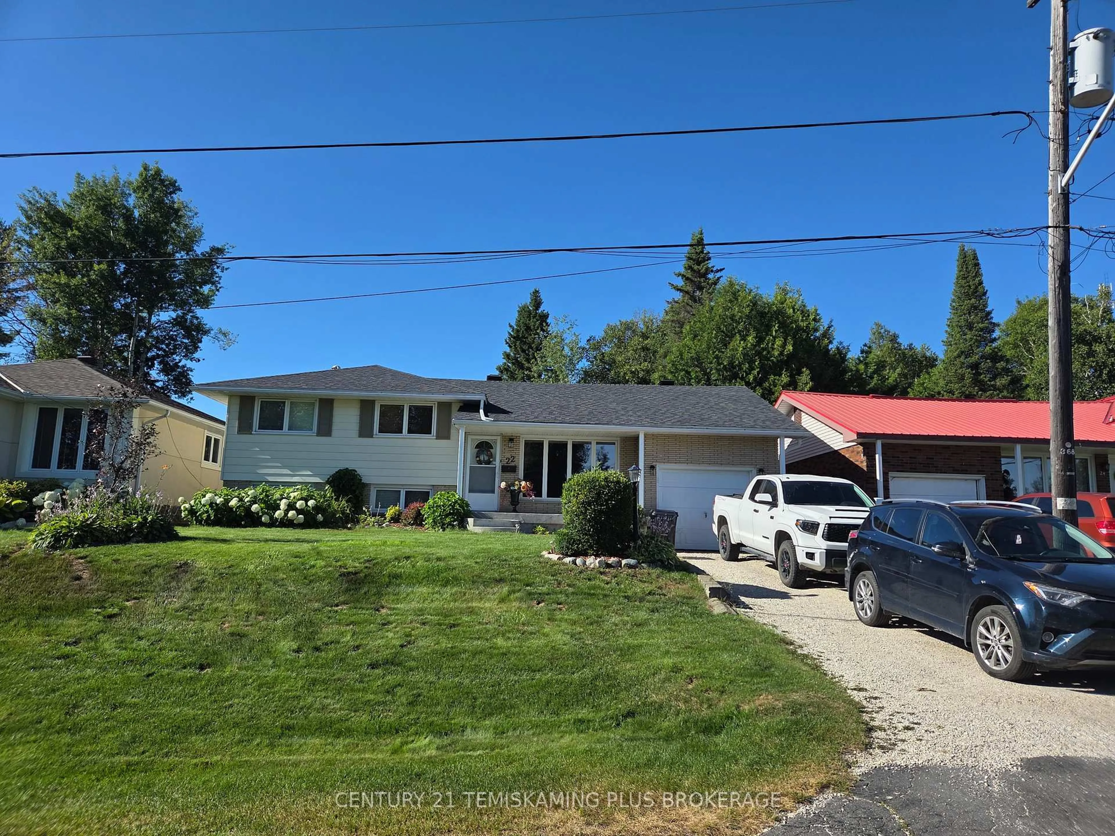 A pic from outside/outdoor area/front of a property/back of a property/a pic from drone, street for 22 Harding Ave, Kirkland Lake Ontario P2N 1B5