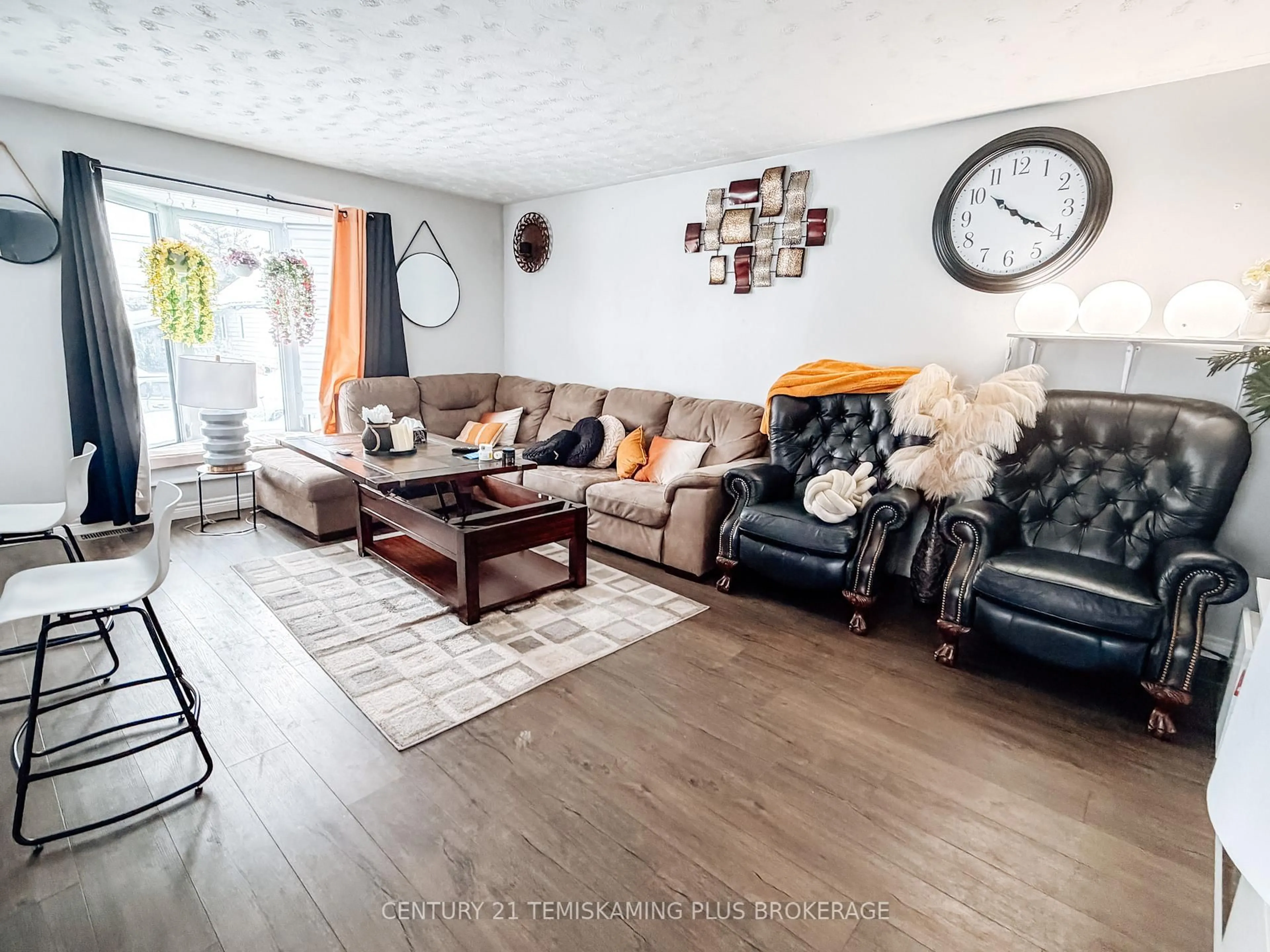 Living room with furniture, wood/laminate floor for 162 Rebecca St, Temiskaming Shores Ontario P0J 1P0