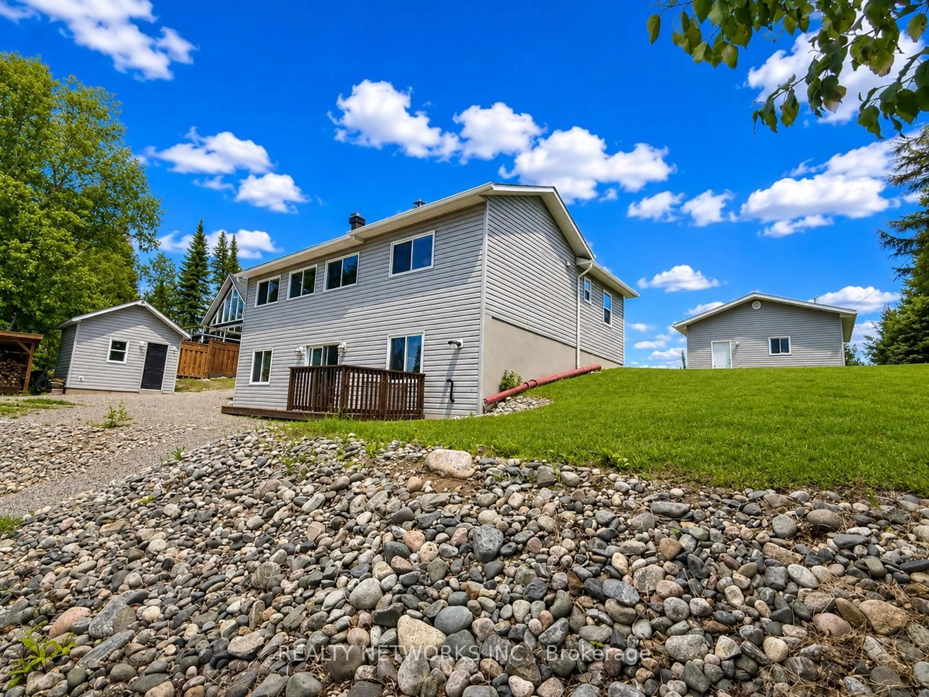 A pic from outside/outdoor area/front of a property/back of a property/a pic from drone, water/lake/river/ocean view for 138 Anderson Dr, Timmins Ontario P0N 1A0