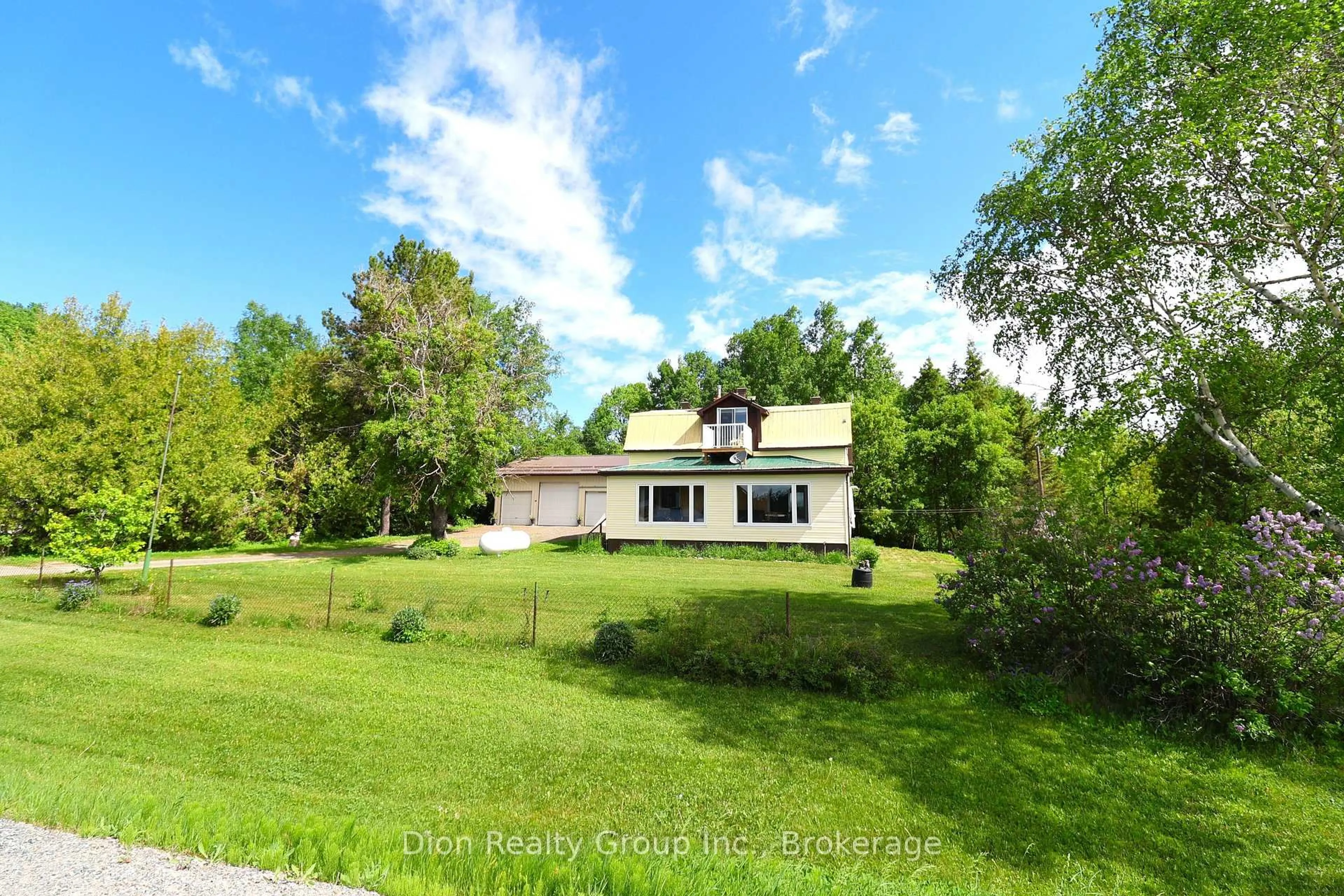 A pic from outside/outdoor area/front of a property/back of a property/a pic from drone, unknown for 129 Highway 570, Kirkland Lake Ontario P0K 1S0