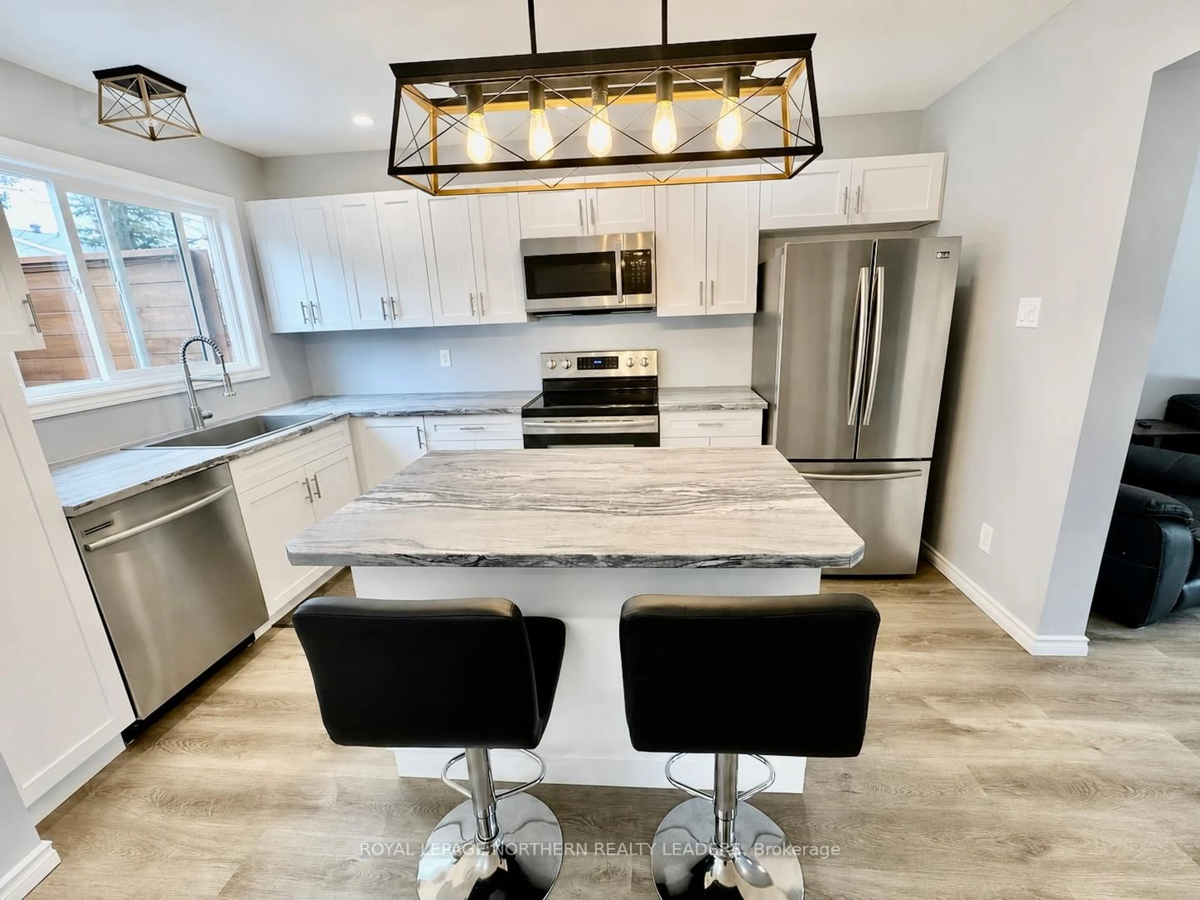 Open concept kitchen, ceramic/tile floor for 562 Spooner Dr, Timmins Ontario P4N 4R5
