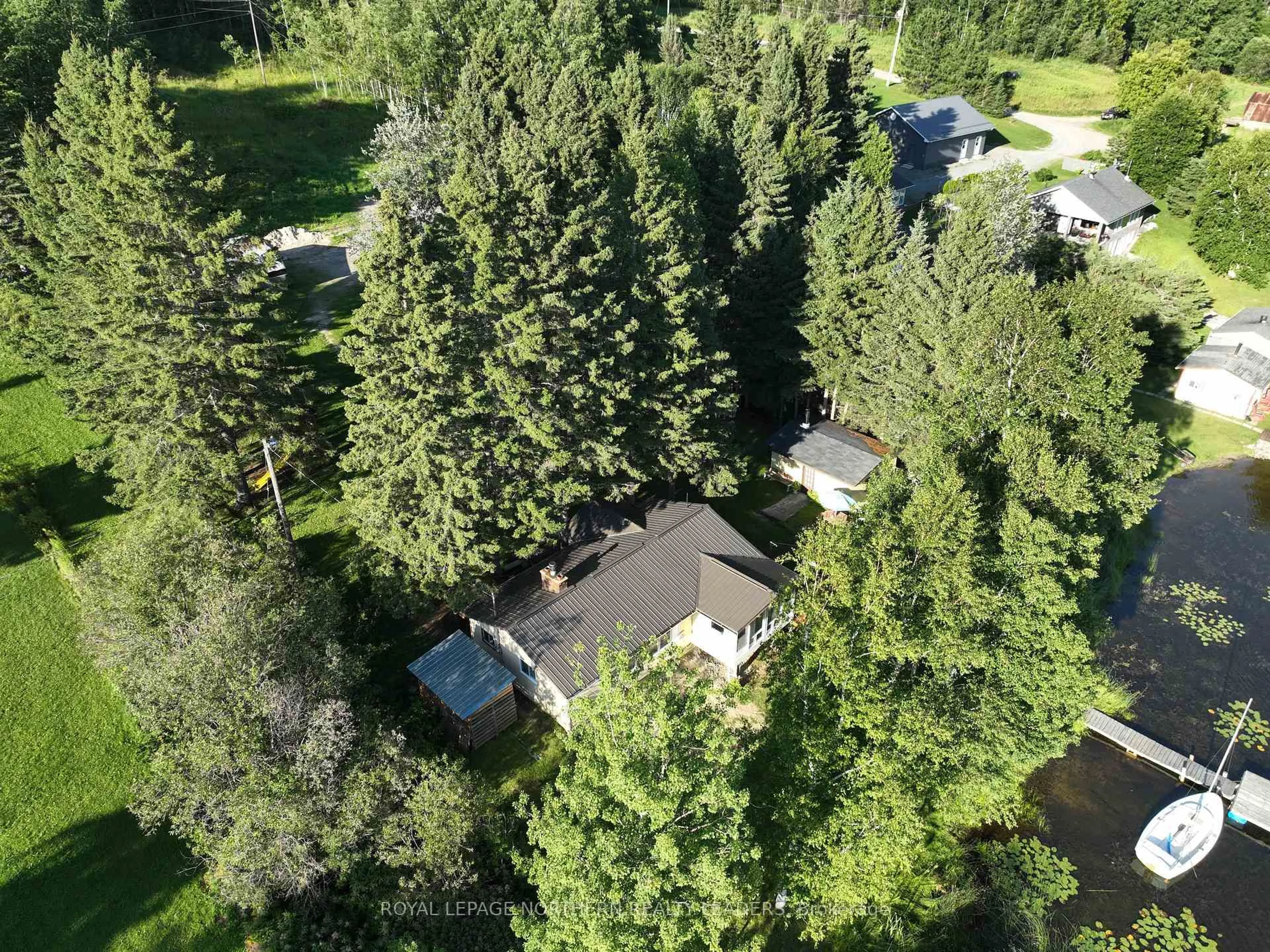 A pic from outside/outdoor area/front of a property/back of a property/a pic from drone, forest/trees view for 1029 Finn Rd, Timmins Ontario P0N 1A0