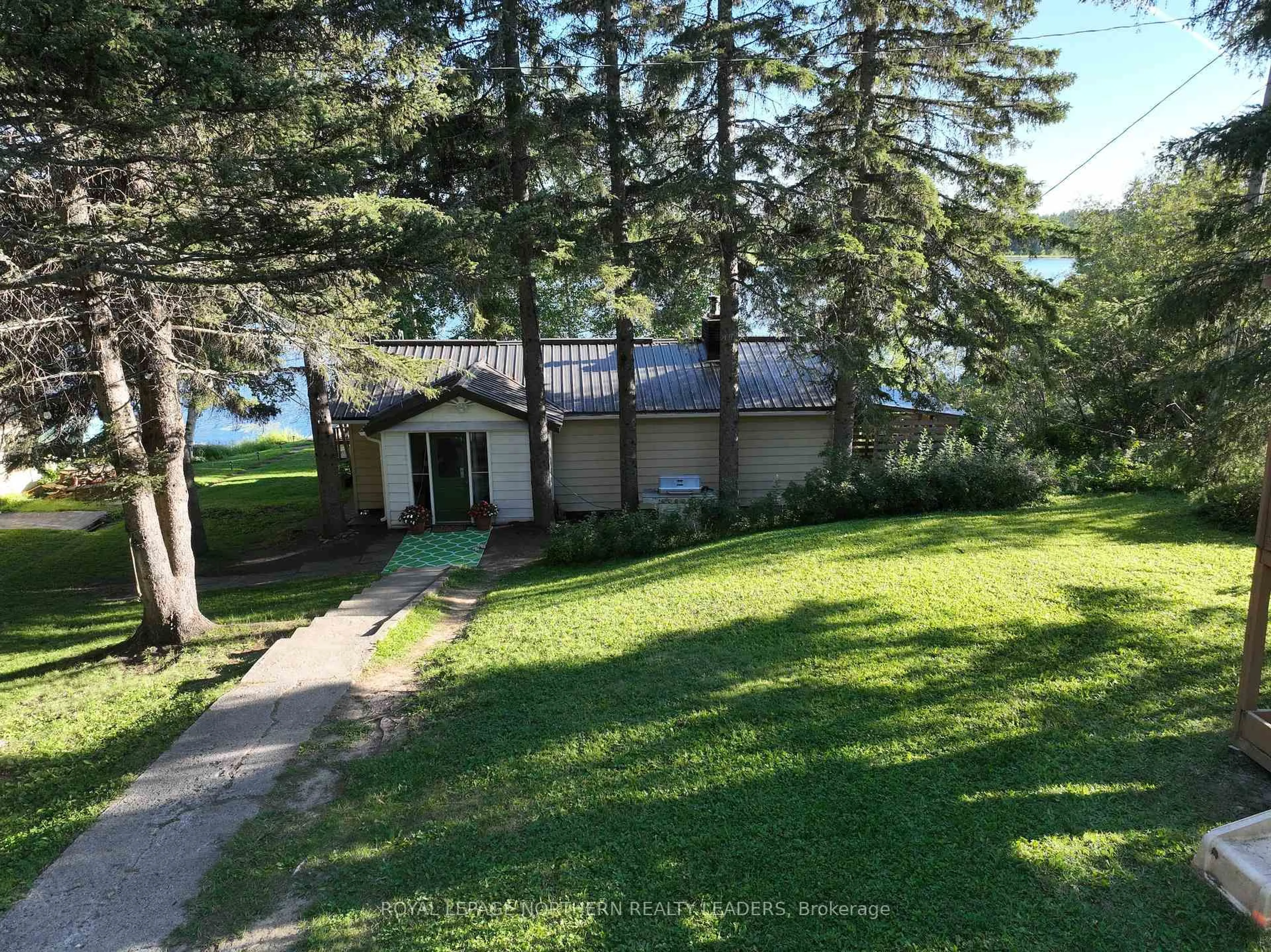 A pic from outside/outdoor area/front of a property/back of a property/a pic from drone, water/lake/river/ocean view for 1029 Finn Rd, Timmins Ontario P0N 1A0