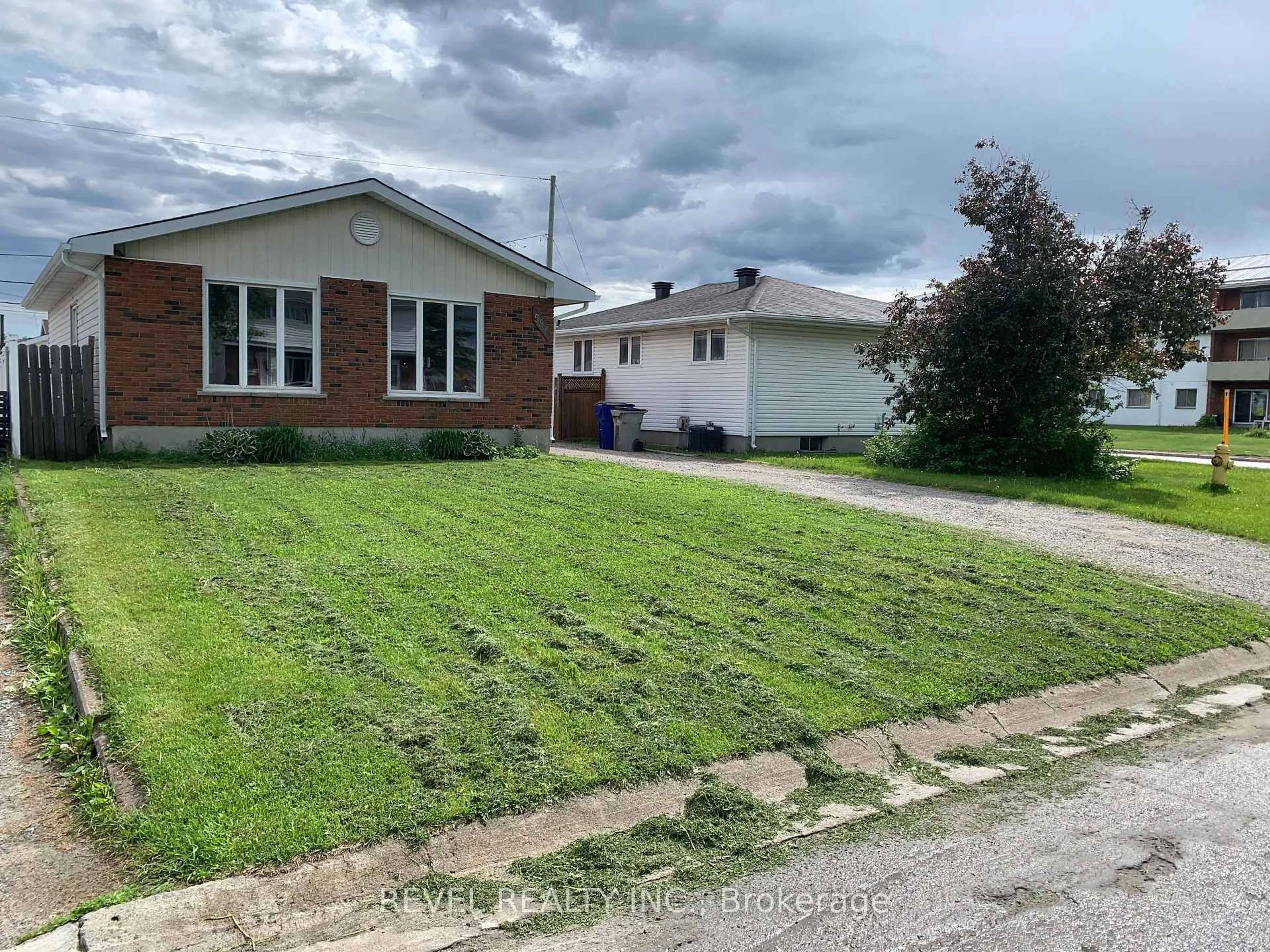 A pic from outside/outdoor area/front of a property/back of a property/a pic from drone, street for 597 Spooner Dr, Timmins Ontario P4N 4R6