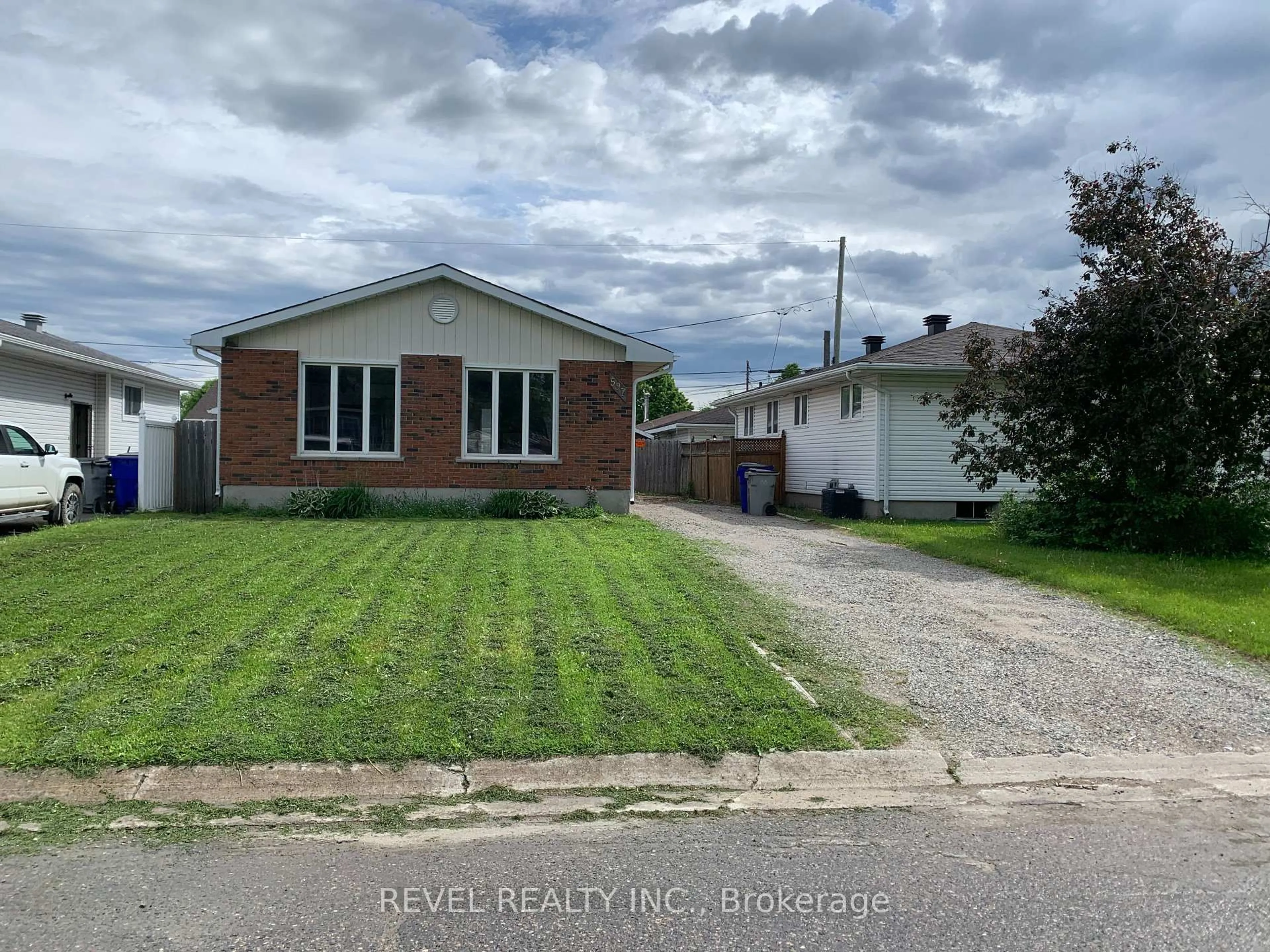 A pic from outside/outdoor area/front of a property/back of a property/a pic from drone, street for 597 Spooner Dr, Timmins Ontario P4N 4R6
