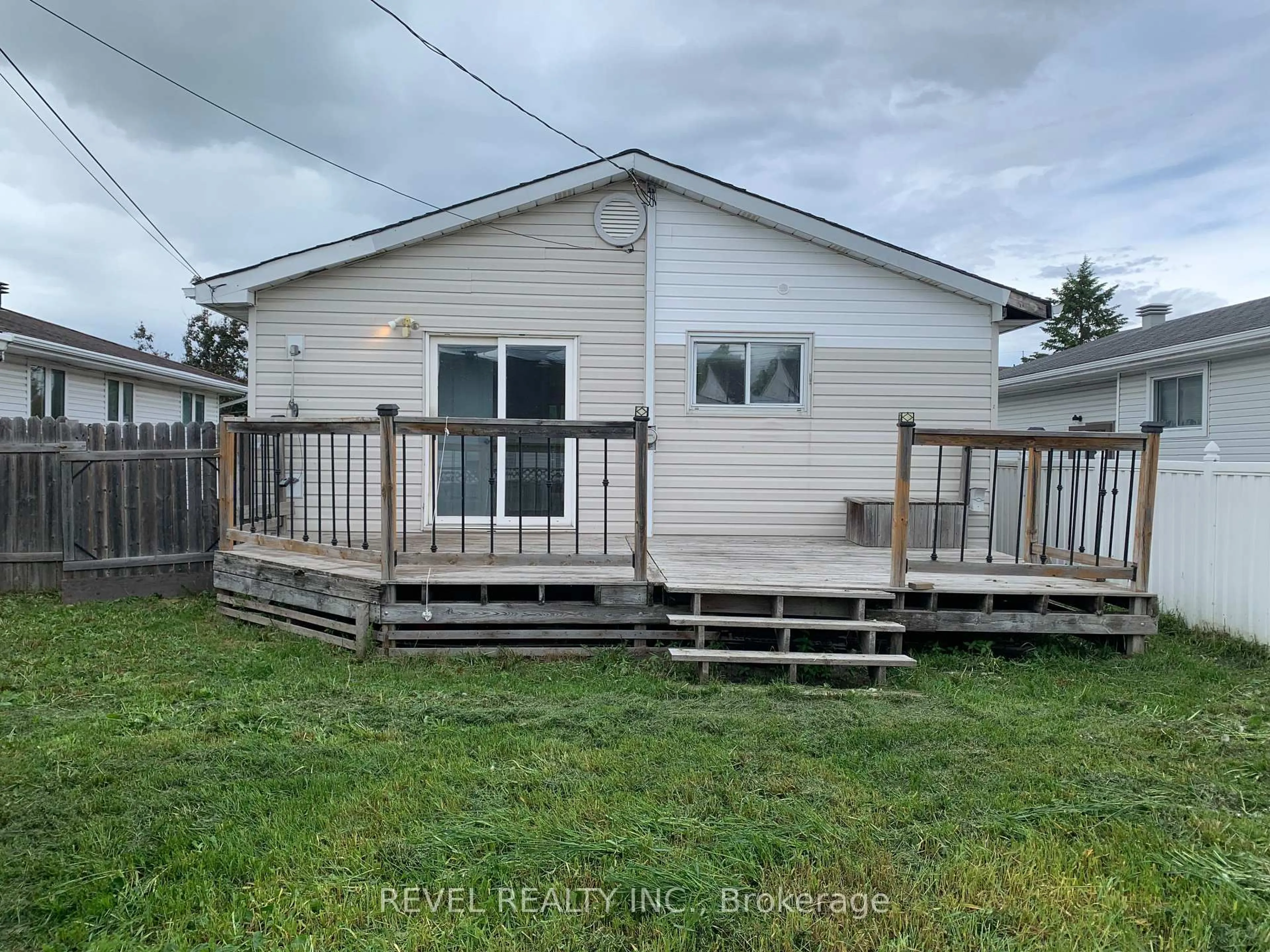A pic from outside/outdoor area/front of a property/back of a property/a pic from drone, water/lake/river/ocean view for 597 Spooner Dr, Timmins Ontario P4N 4R6