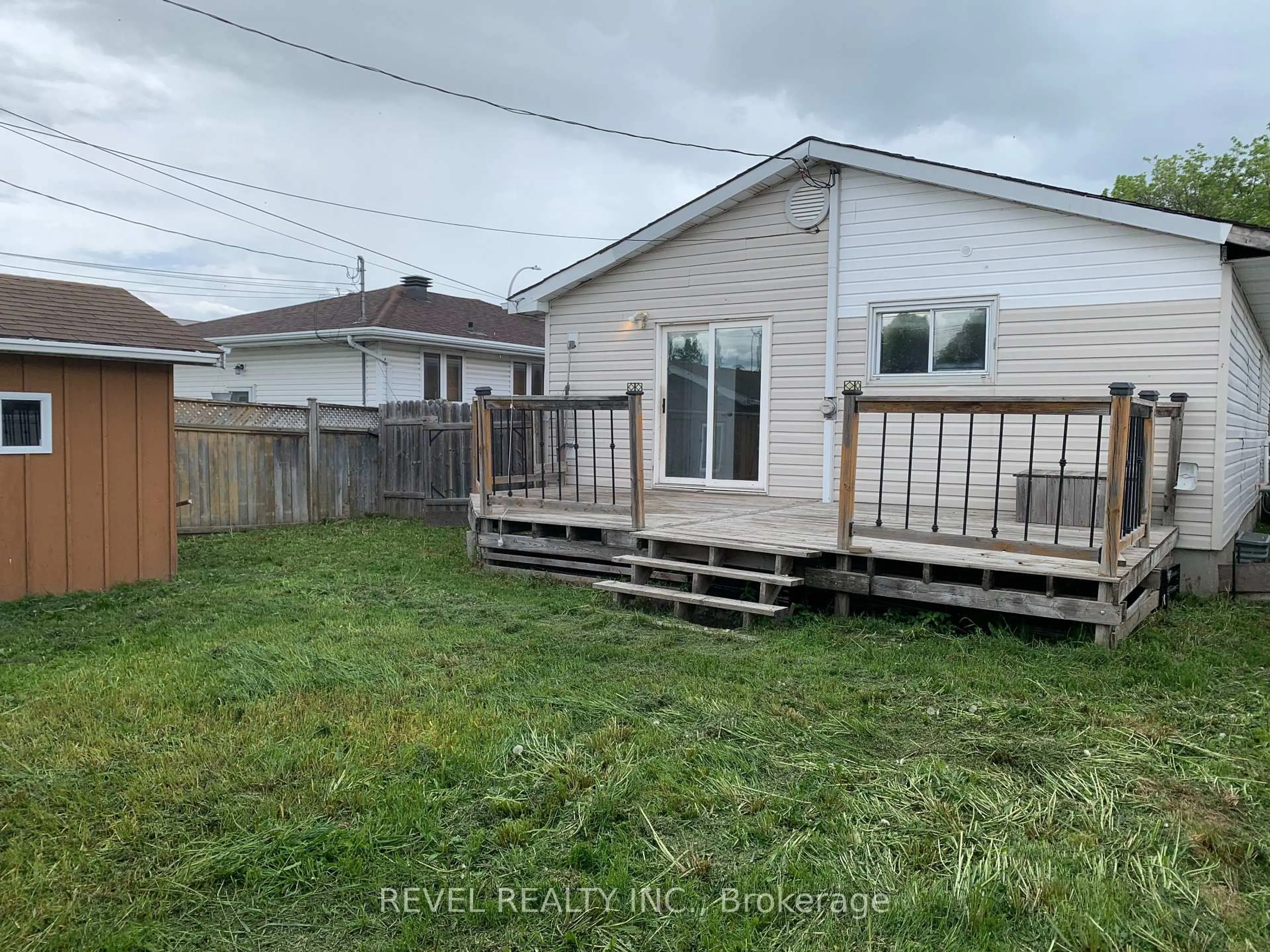 A pic from outside/outdoor area/front of a property/back of a property/a pic from drone, unknown for 597 Spooner Dr, Timmins Ontario P4N 4R6