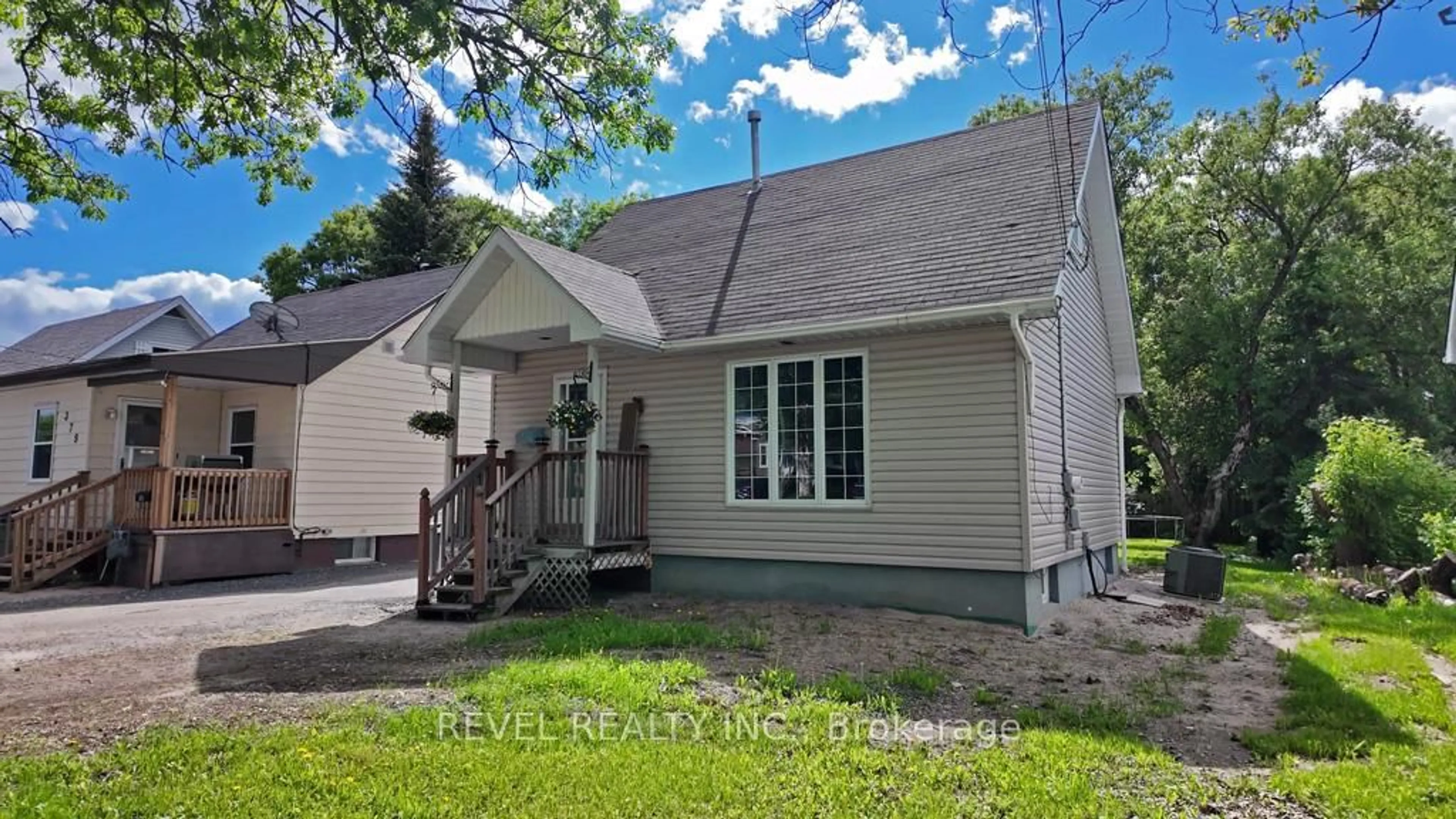 Home with vinyl exterior material, street for 385 Cedar St, Timmins Ontario P4N 6K1