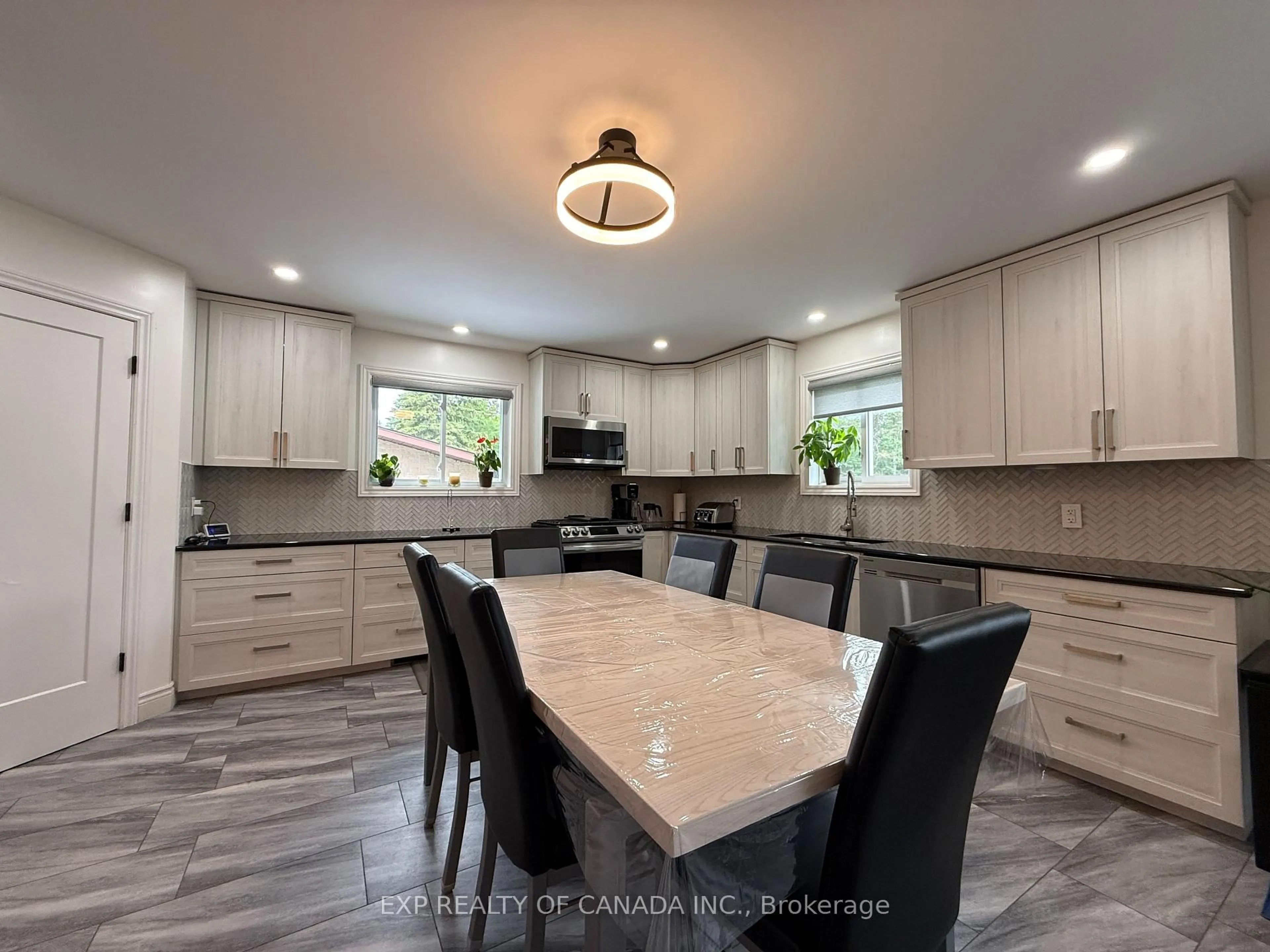 Open concept kitchen, ceramic/tile floor for 245 Polaris Rd, Timmins Ontario P4N 8A7