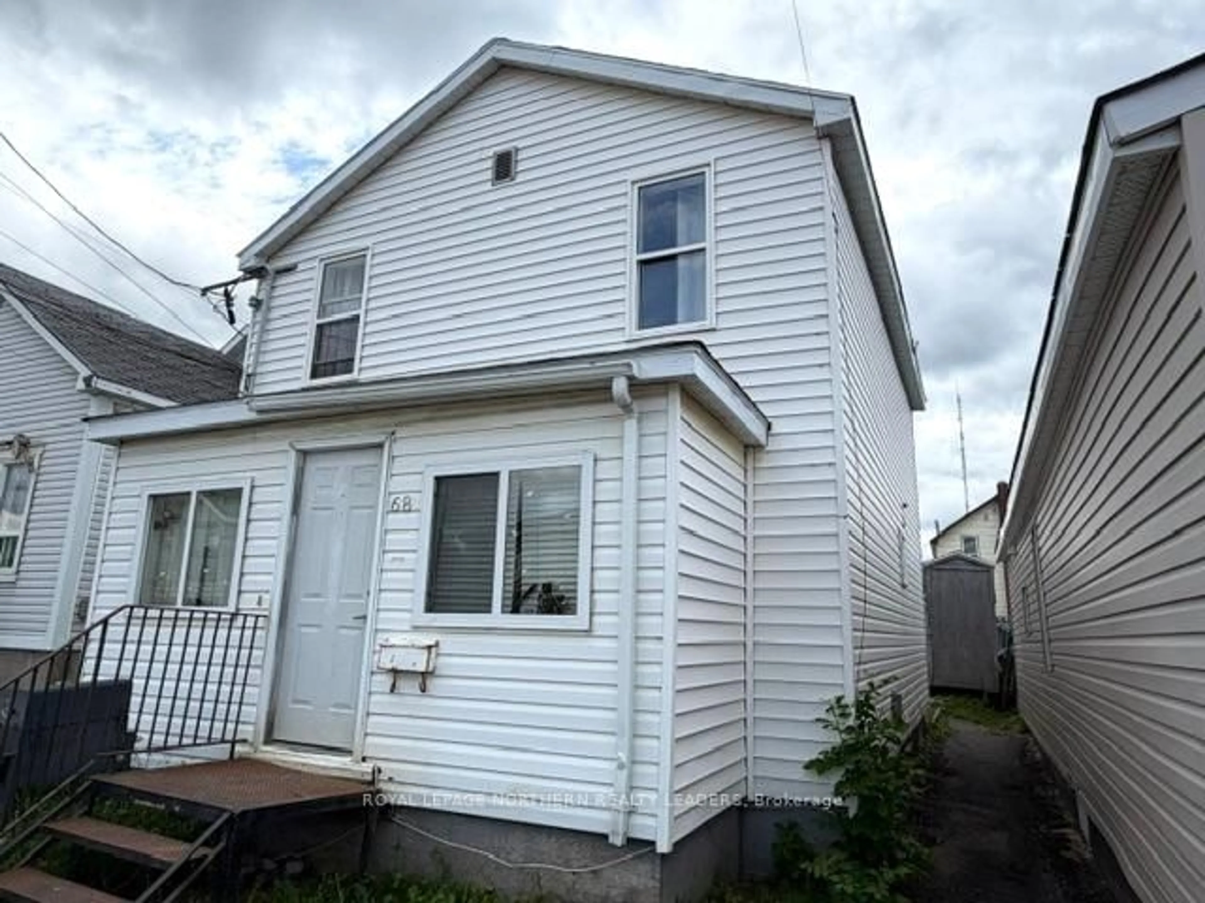 Home with vinyl exterior material, street for 68 Father Costello Dr, Timmins Ontario P0N 1G0