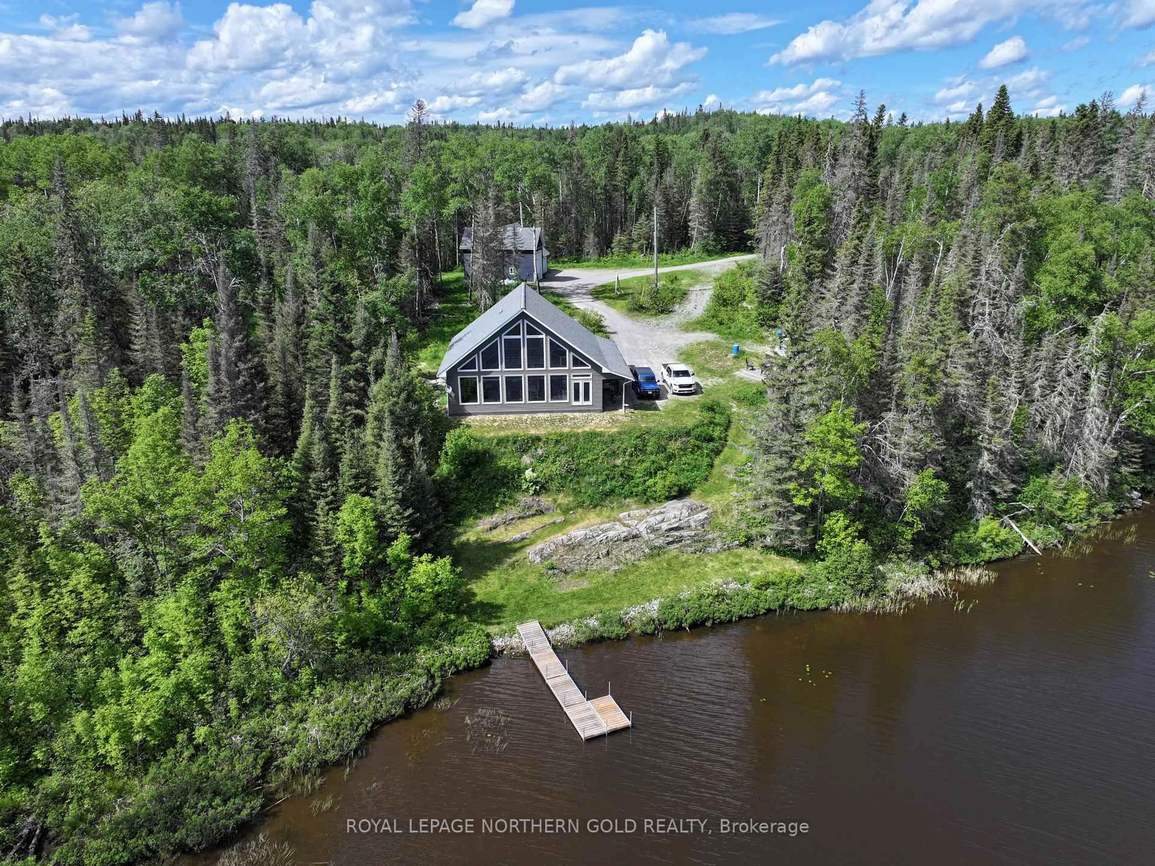 A pic from outside/outdoor area/front of a property/back of a property/a pic from drone, water/lake/river/ocean view for 125 Athenia Blvd, Kirkland Lake Ontario P0K 1T0