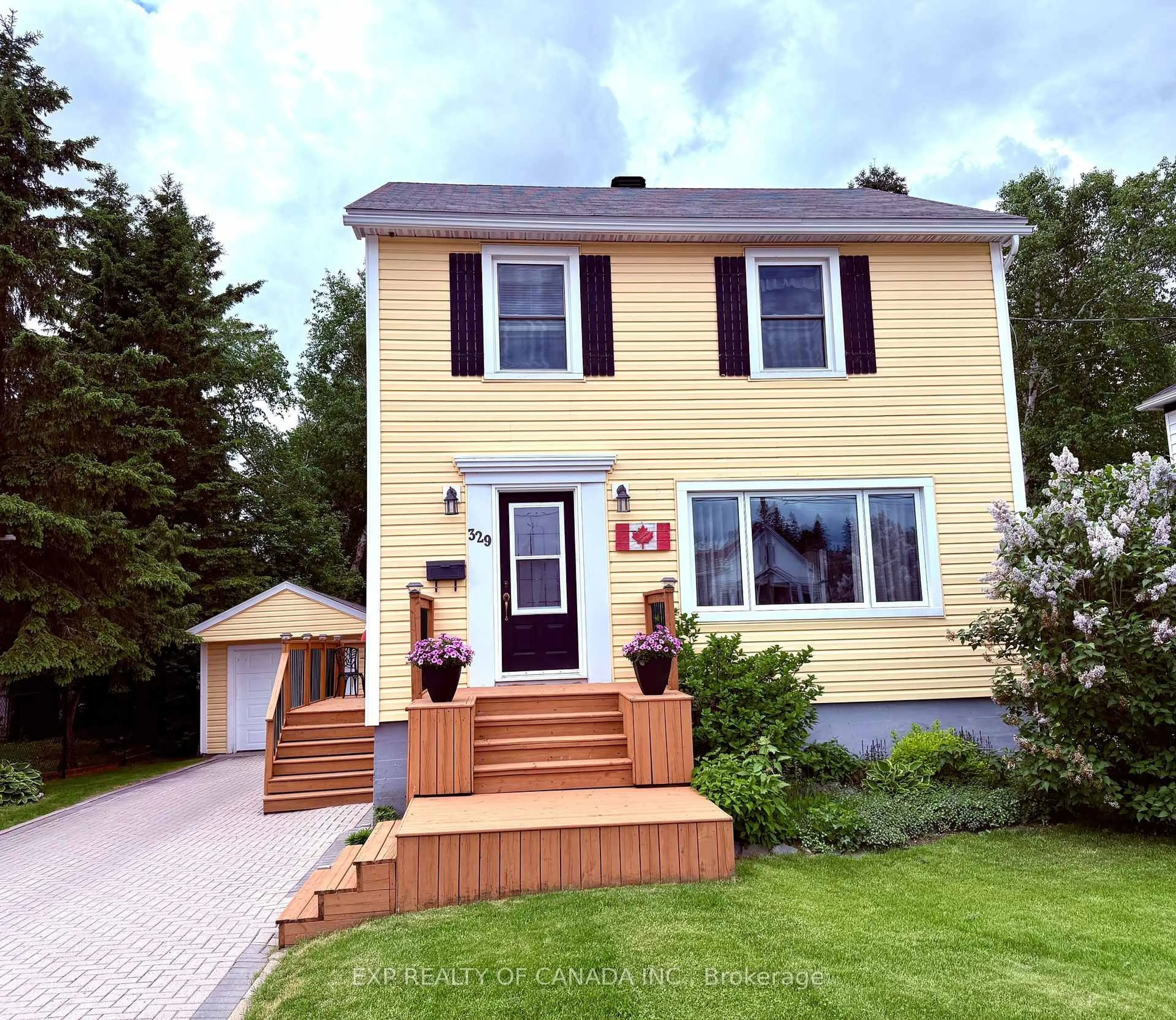 Home with vinyl exterior material, street for 329 Tamarack St, Timmins Ontario P4N 6R3