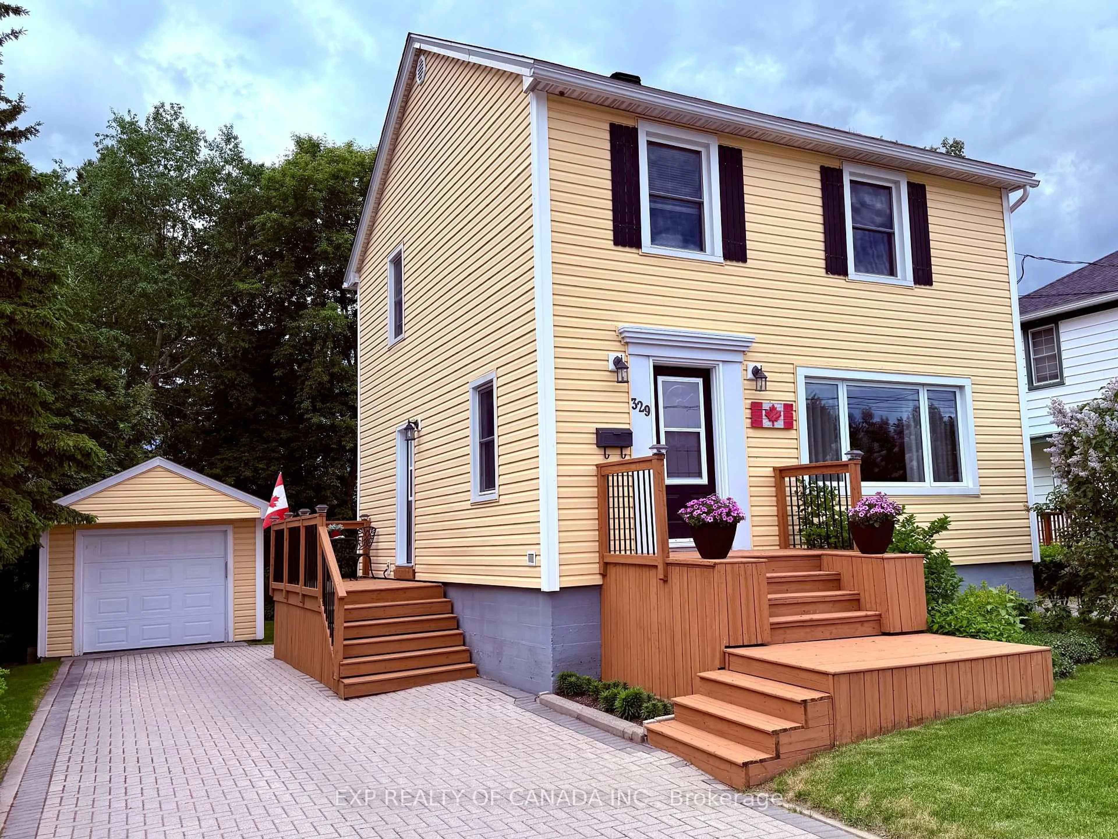 Home with vinyl exterior material, street for 329 Tamarack St, Timmins Ontario P4N 6R3