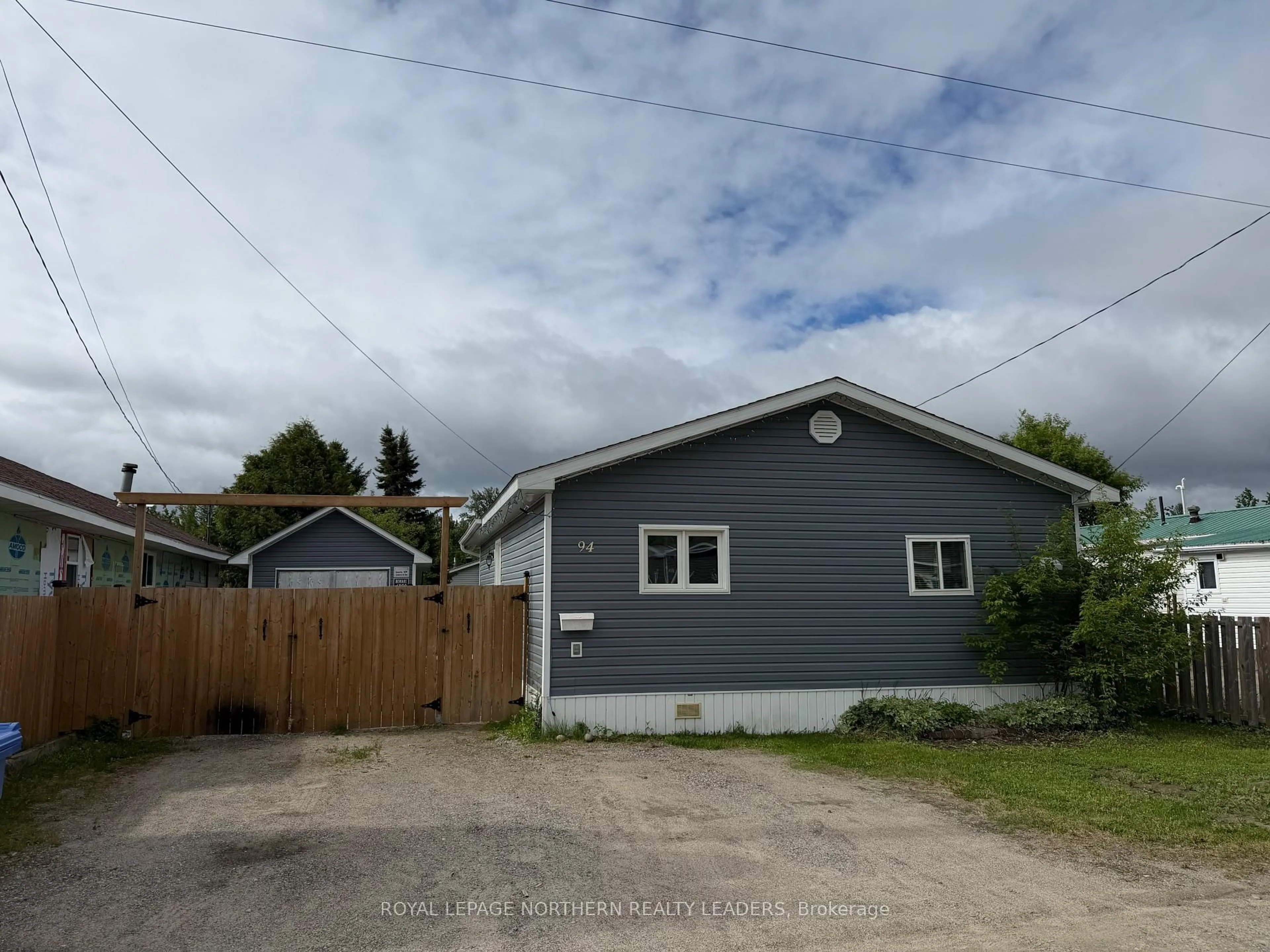 A pic from outside/outdoor area/front of a property/back of a property/a pic from drone, street for 94 Notre Dame St, Timmins Ontario P4R 0C9