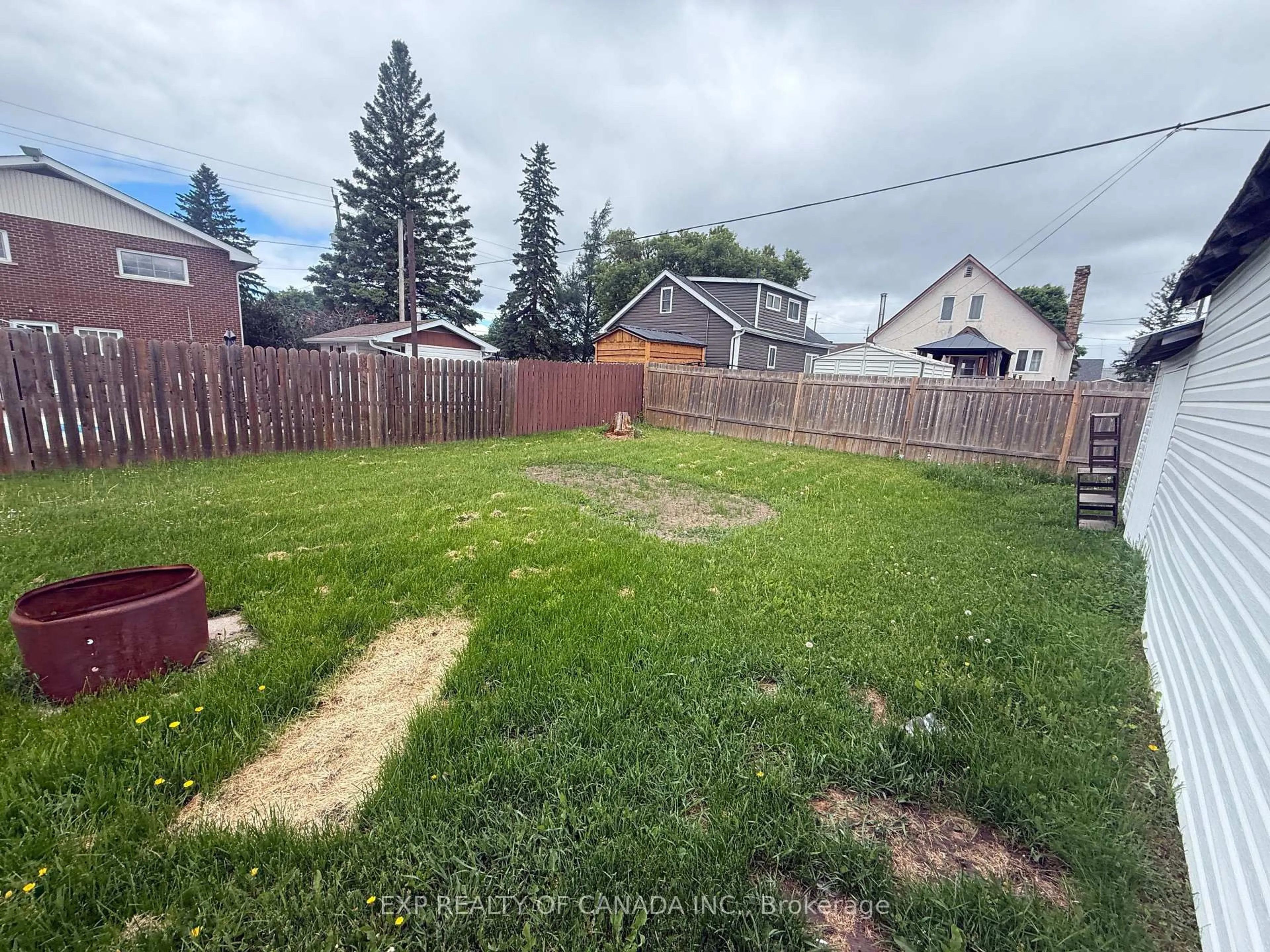A pic from outside/outdoor area/front of a property/back of a property/a pic from drone, street for 50 Cecil Ave, Timmins Ontario P0N 1H0