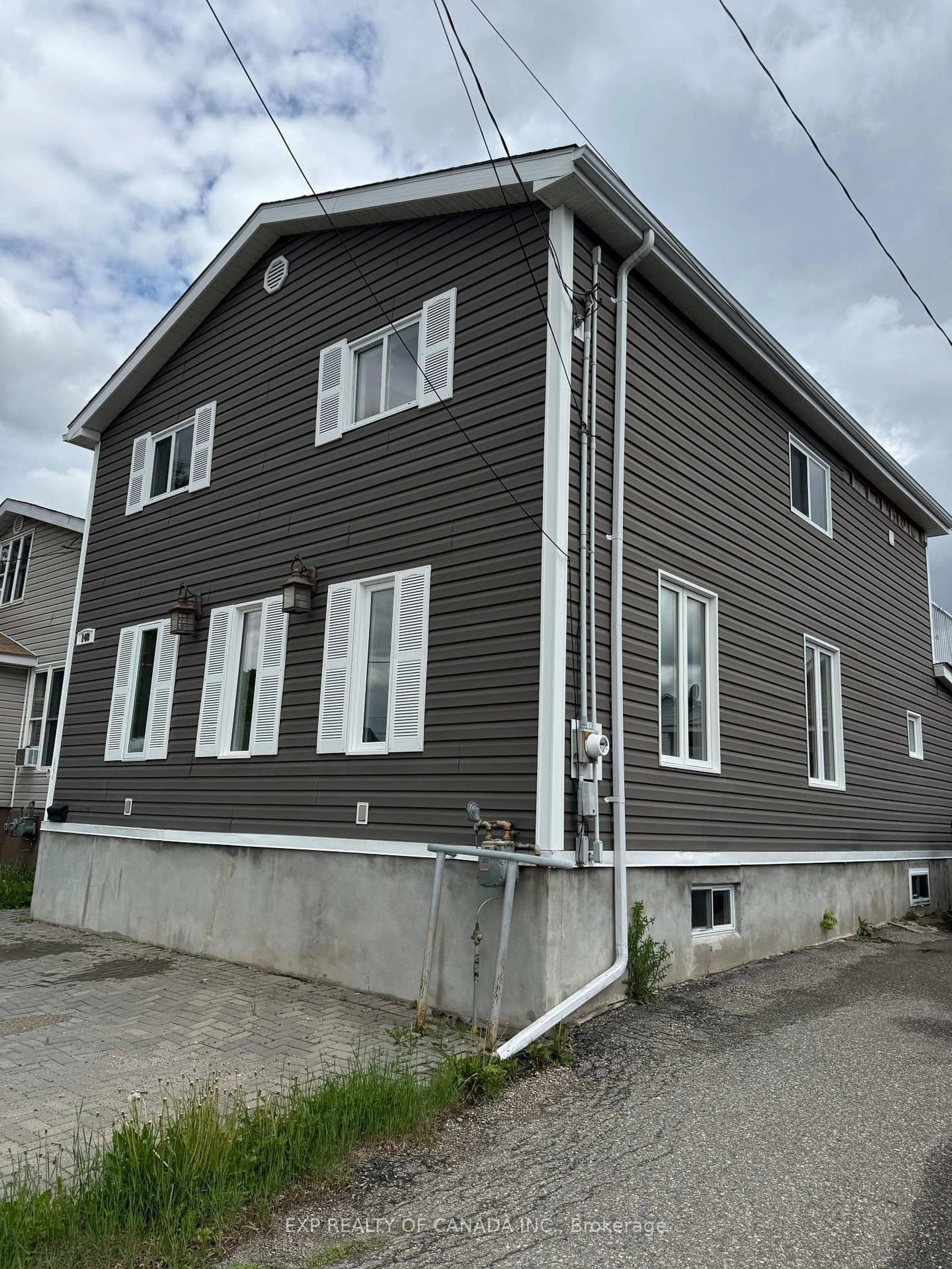 Home with vinyl exterior material, building for 148 Elm St, Timmins Ontario P4N 6A7
