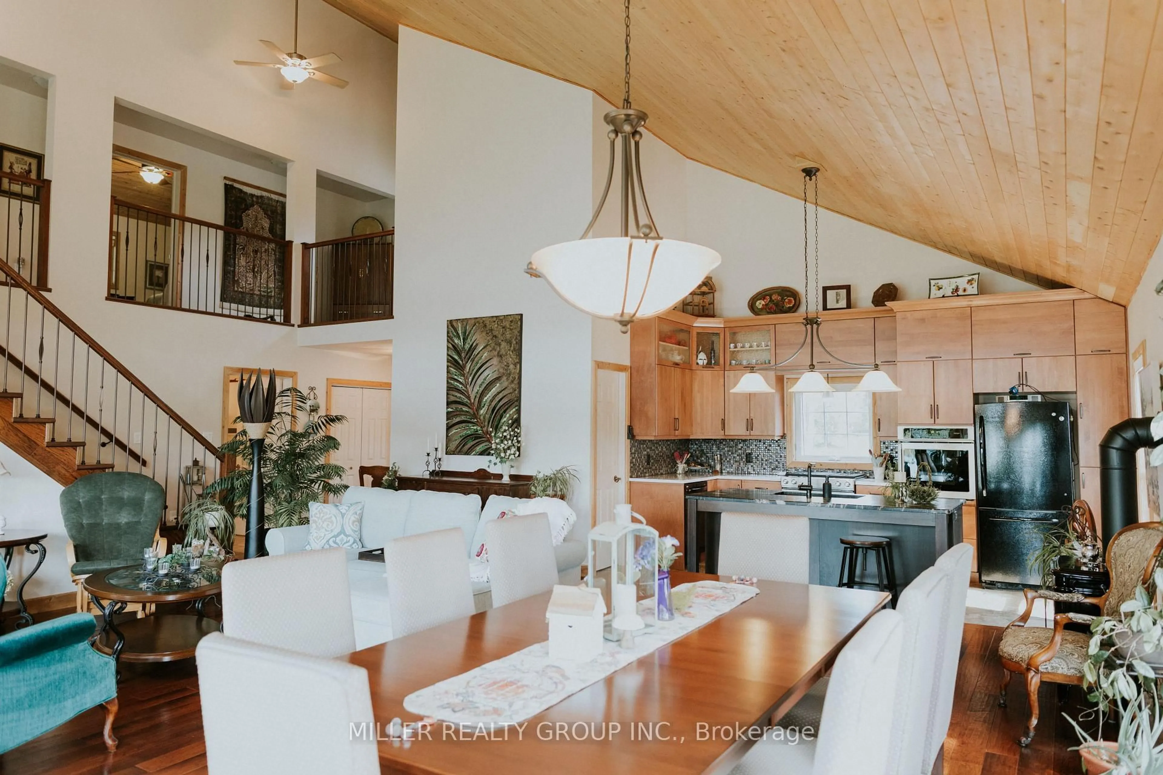 Open concept kitchen, wood/laminate floor for 877606 Bass Lake Rd, Timiskaming Ontario P0J 1C0
