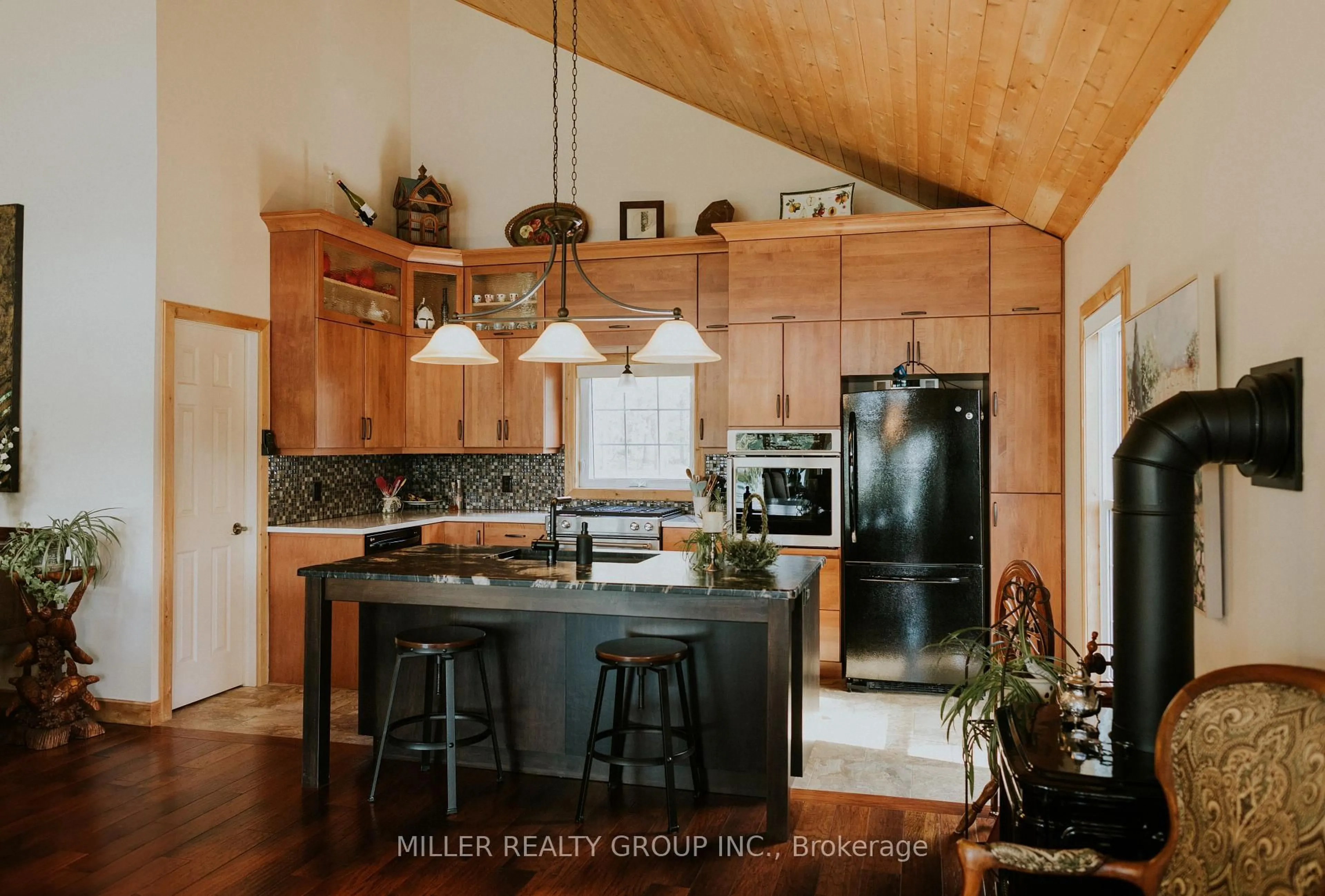 Open concept kitchen, ceramic/tile floor for 877606 Bass Lake Rd, Timiskaming Ontario P0J 1C0