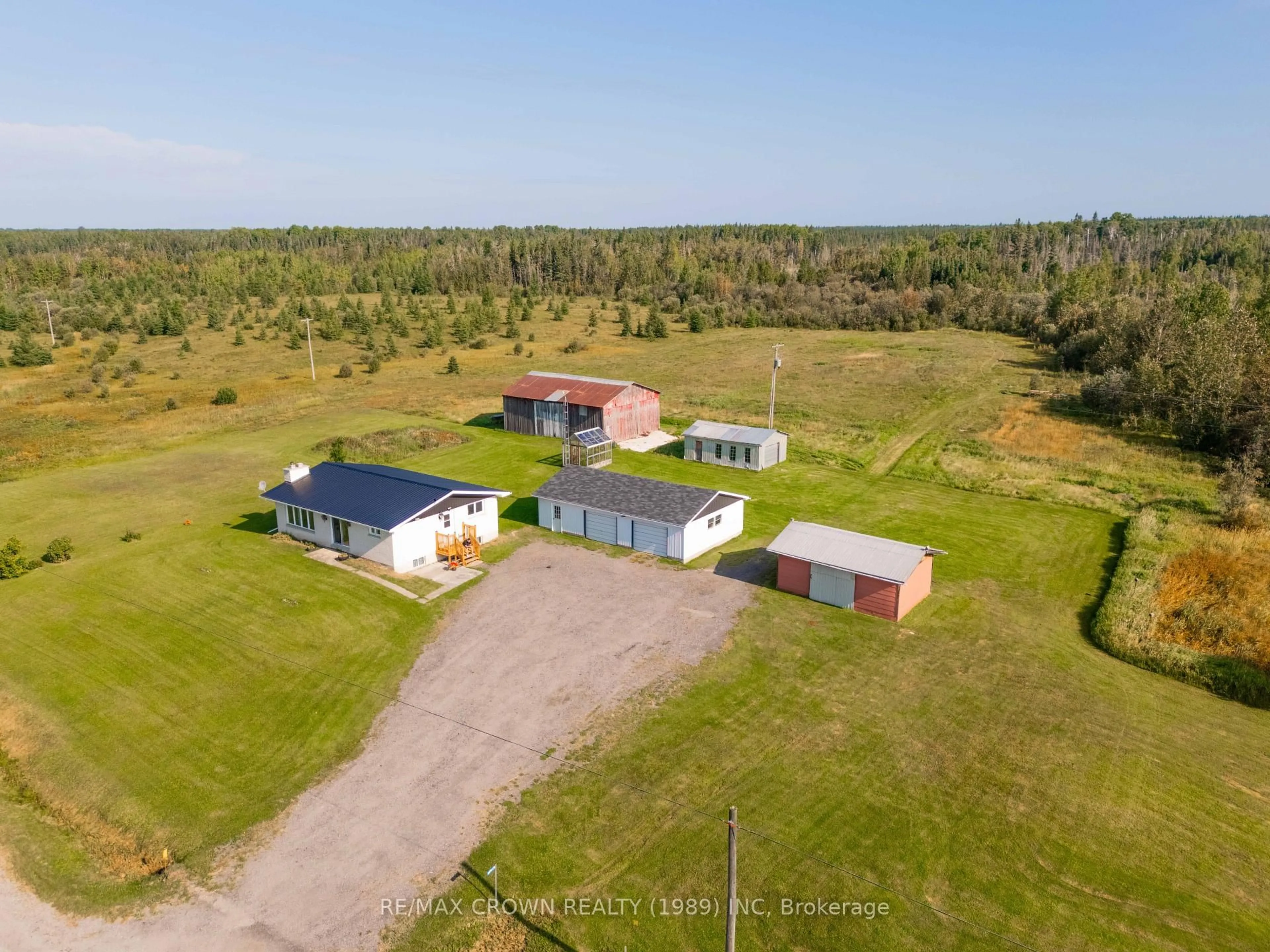 A pic from outside/outdoor area/front of a property/back of a property/a pic from drone, building for 14 LOT CON 9 HIGHWAY 11 #Haggart, Smooth Rock Falls Ontario P0L 2B0