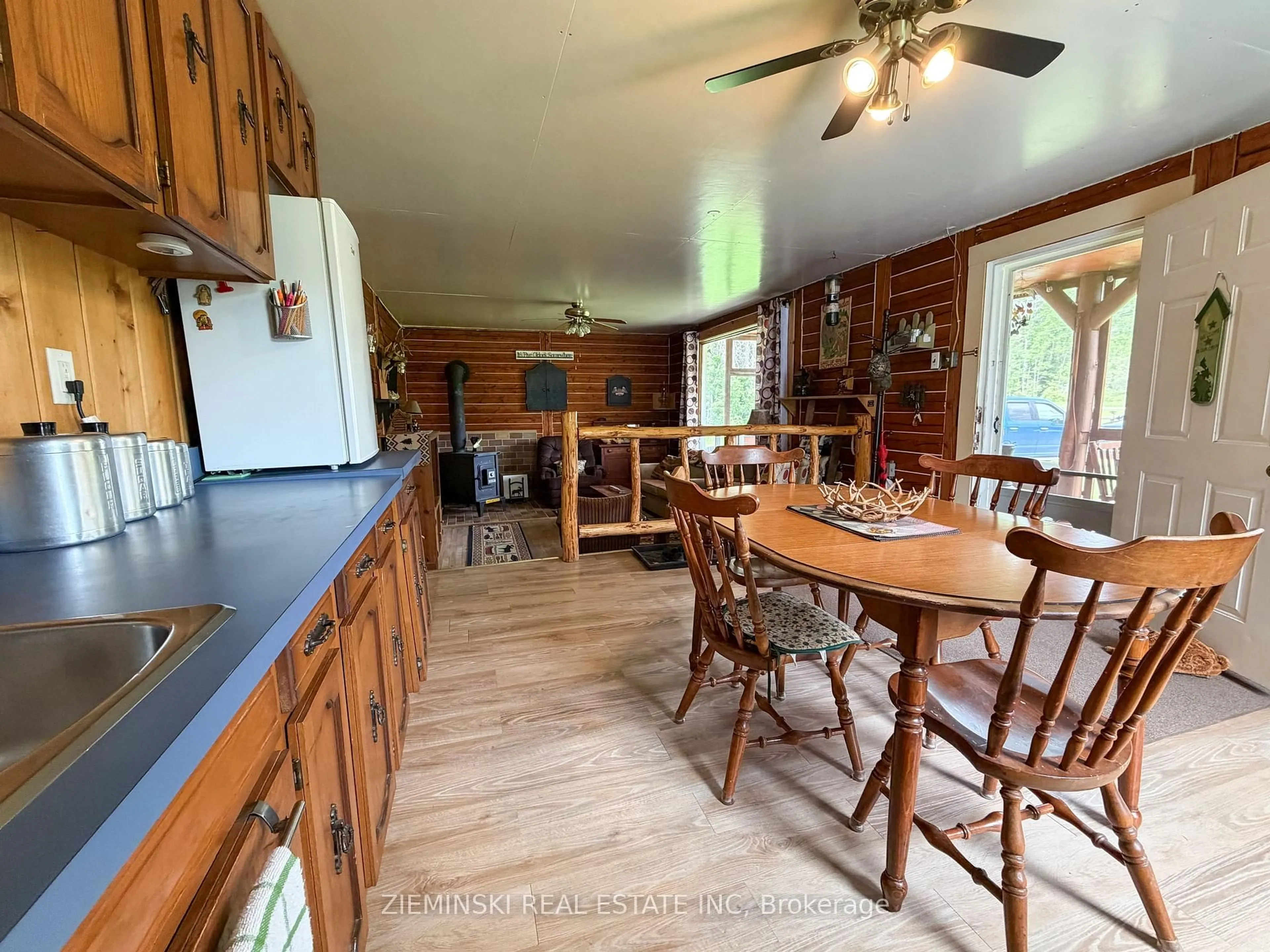Open concept kitchen, wood/laminate floor for 22 Rapids Ave, Cochrane Ontario P0L 1C0